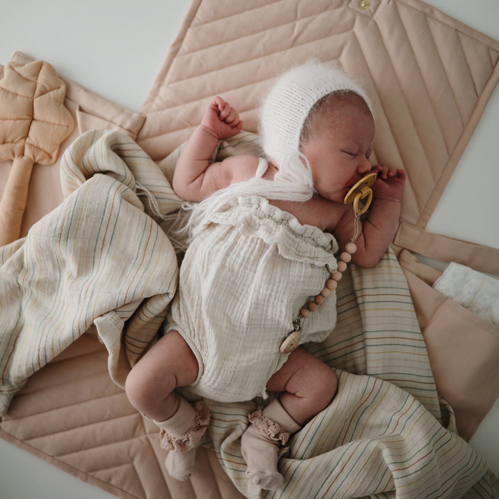 Mushie vystymo padėkliukas Blush