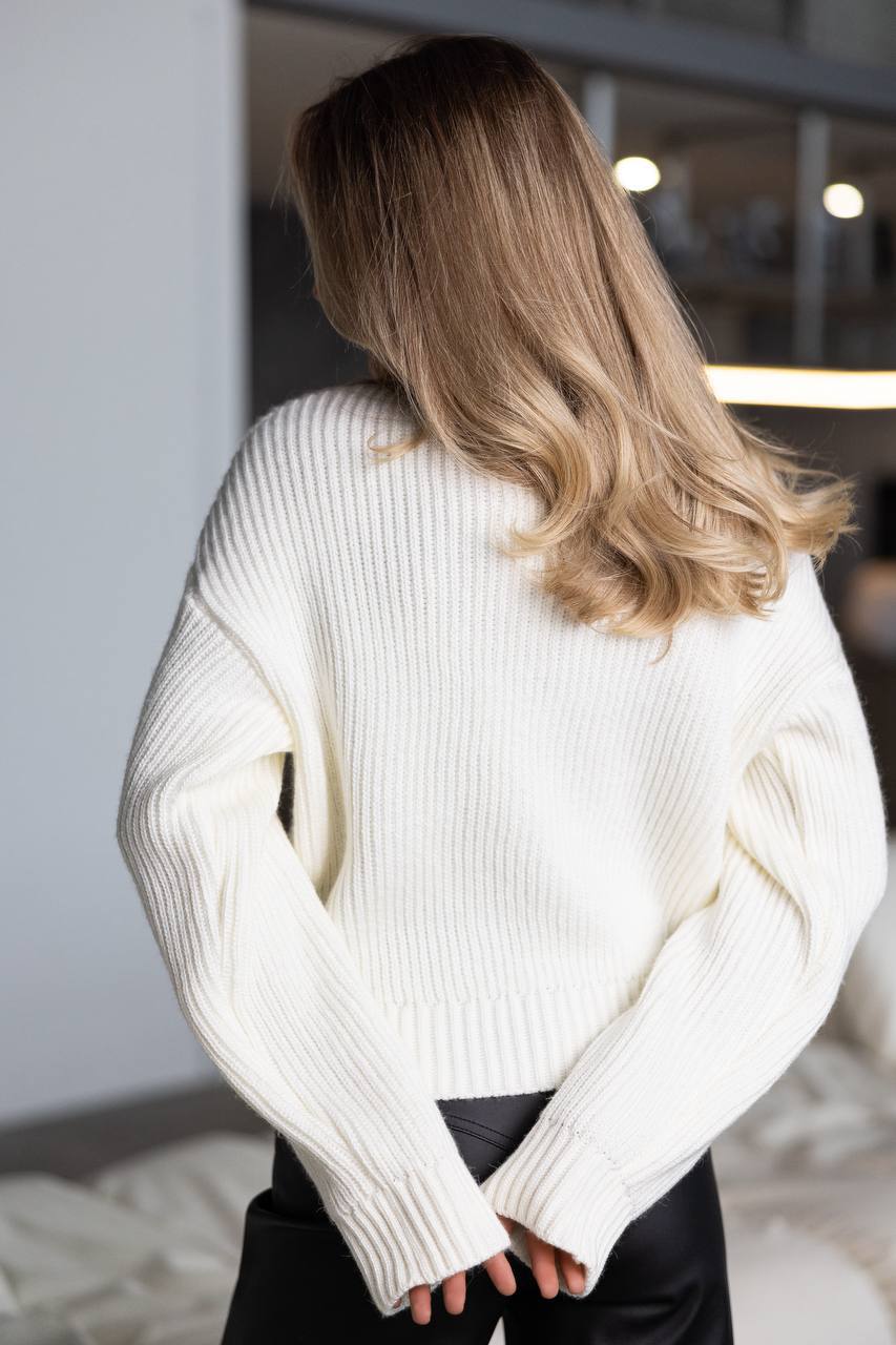 Baltas megztukas su vilna