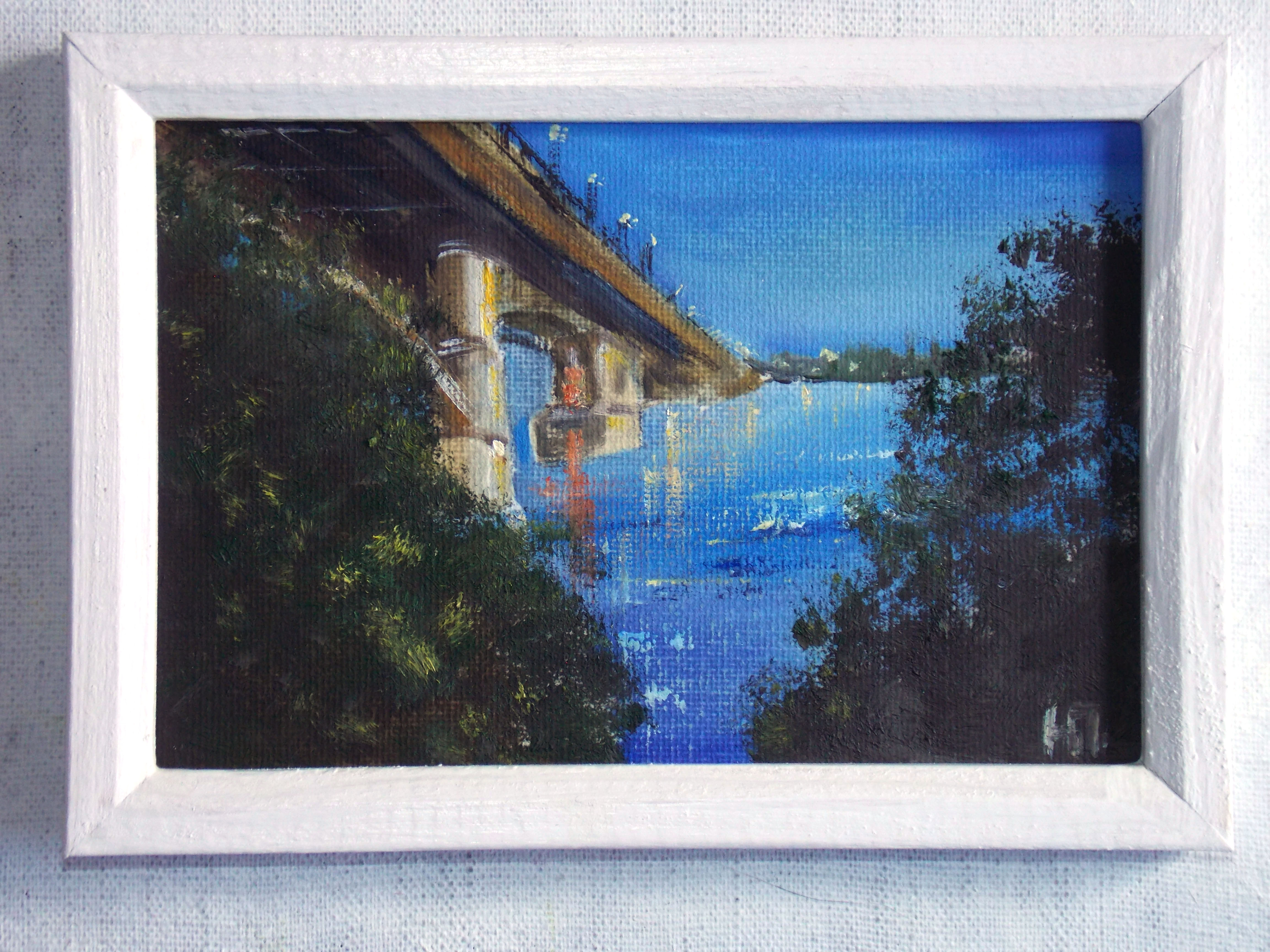 Night river, evening embankment
