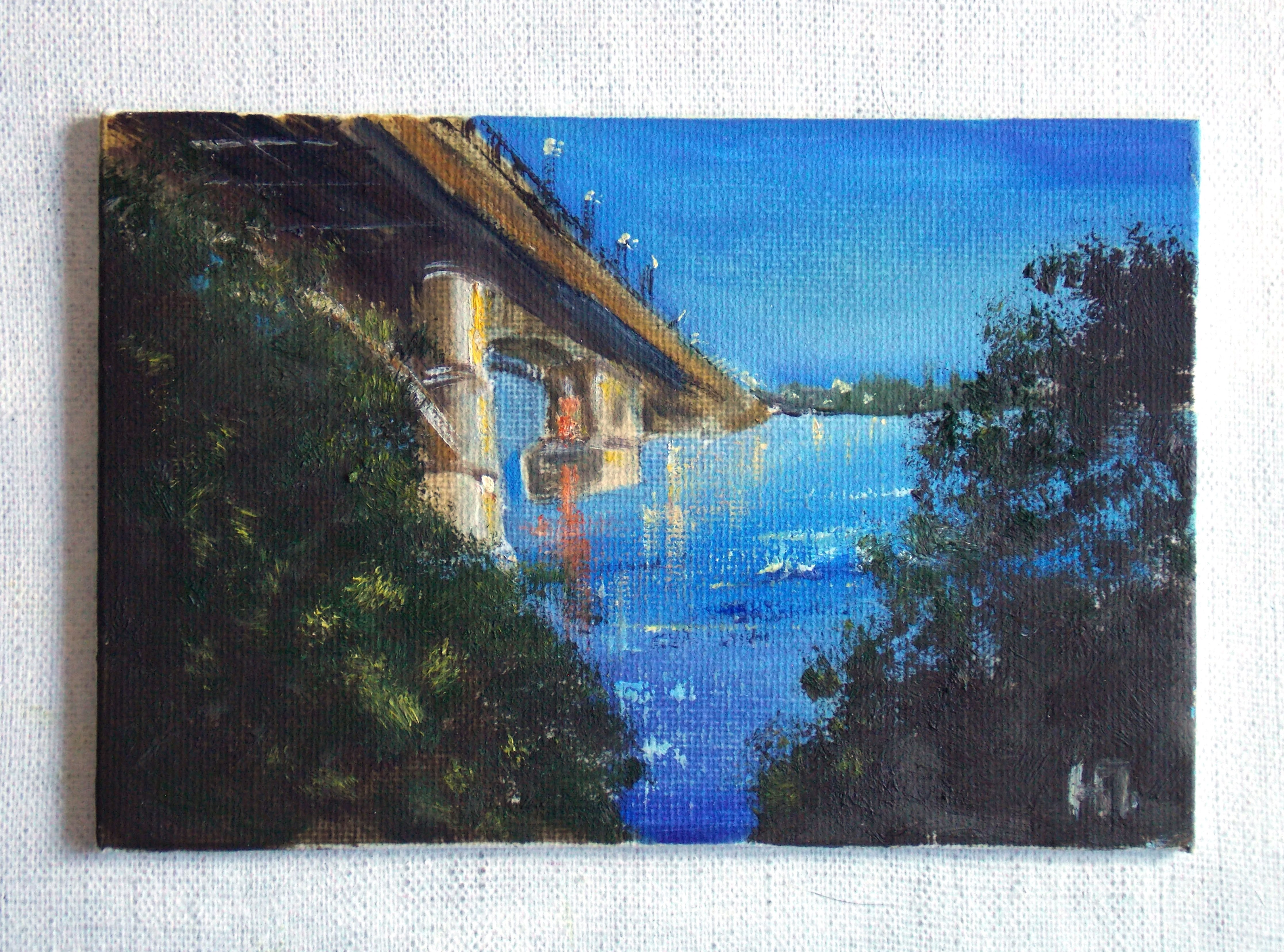 Night river, evening embankment
