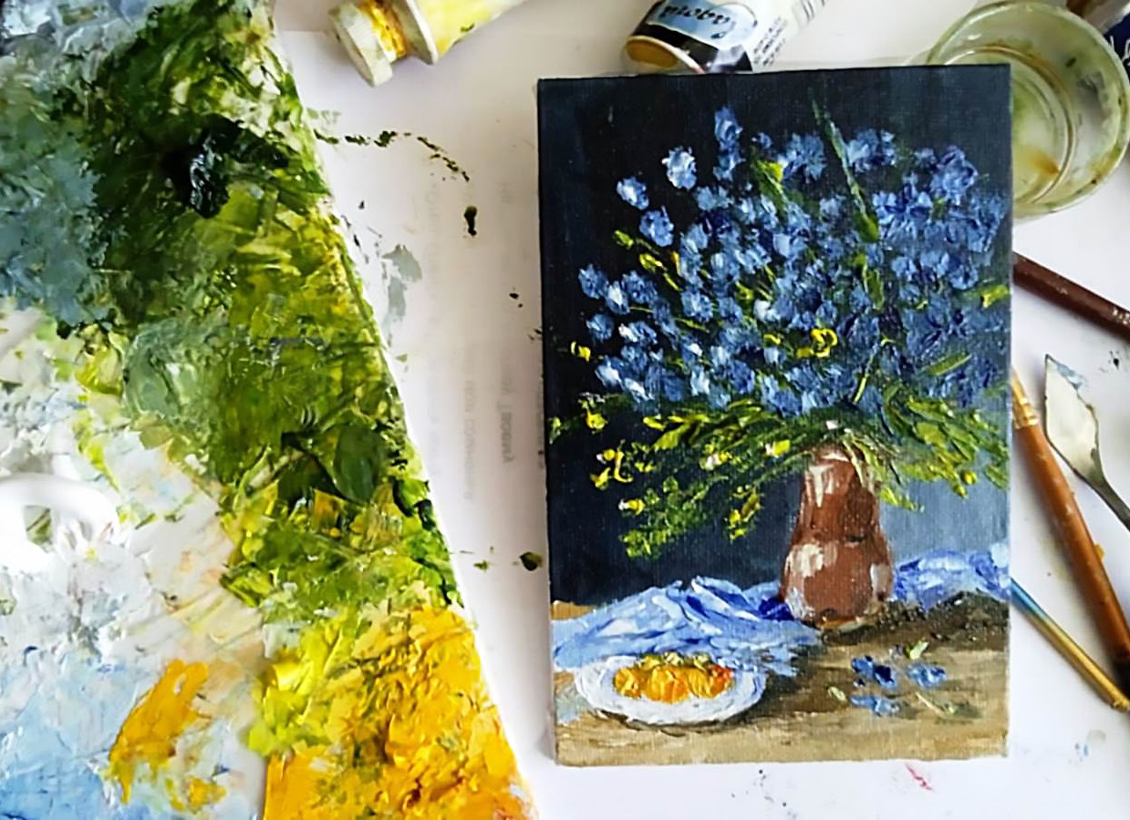 forget-me-nots, Blue flowers in striped vase