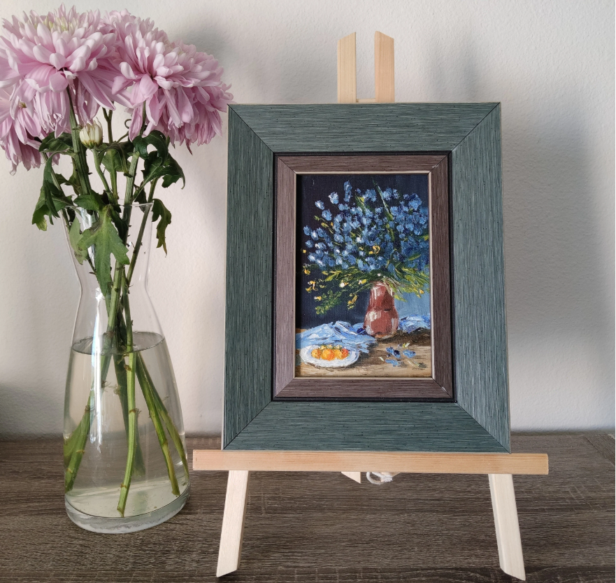 forget-me-nots, Blue flowers in striped vase