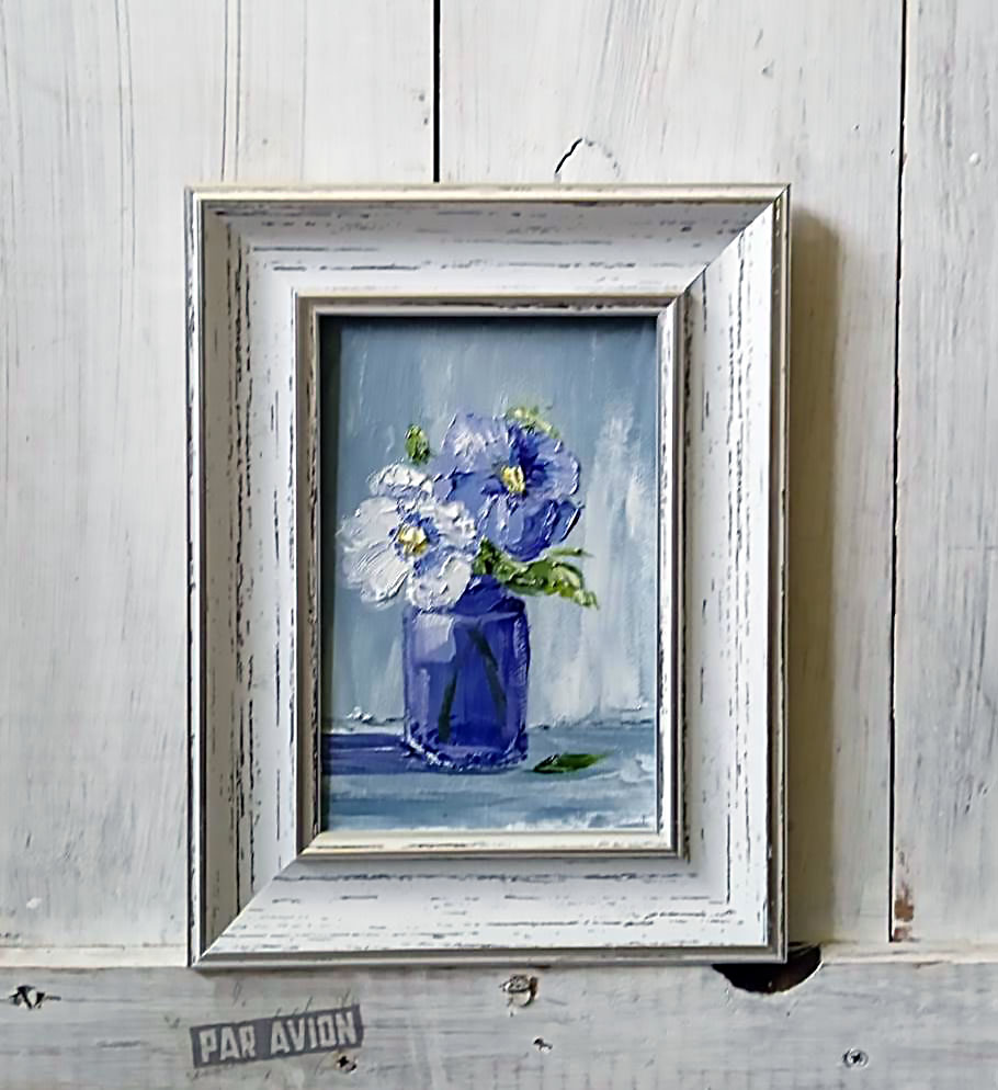 Flowers in a blue vase.