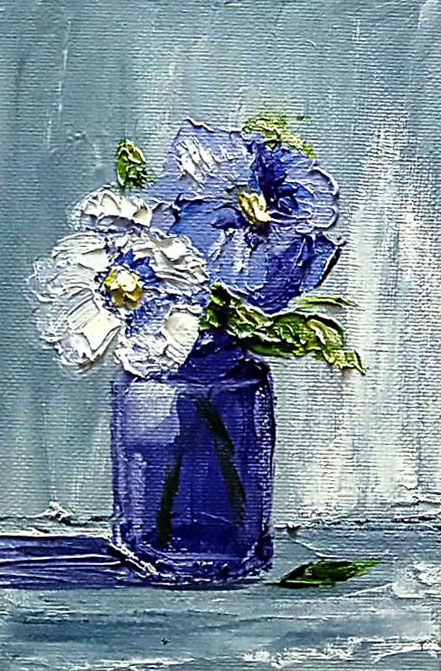 Flowers in a blue vase.