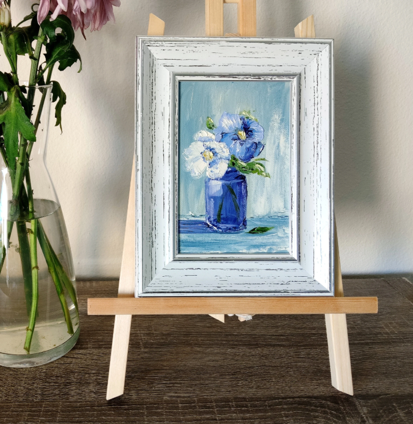 Flowers in a blue vase.