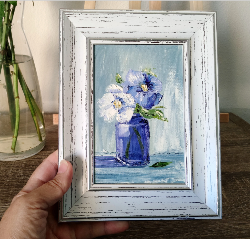 Flowers in a blue vase.