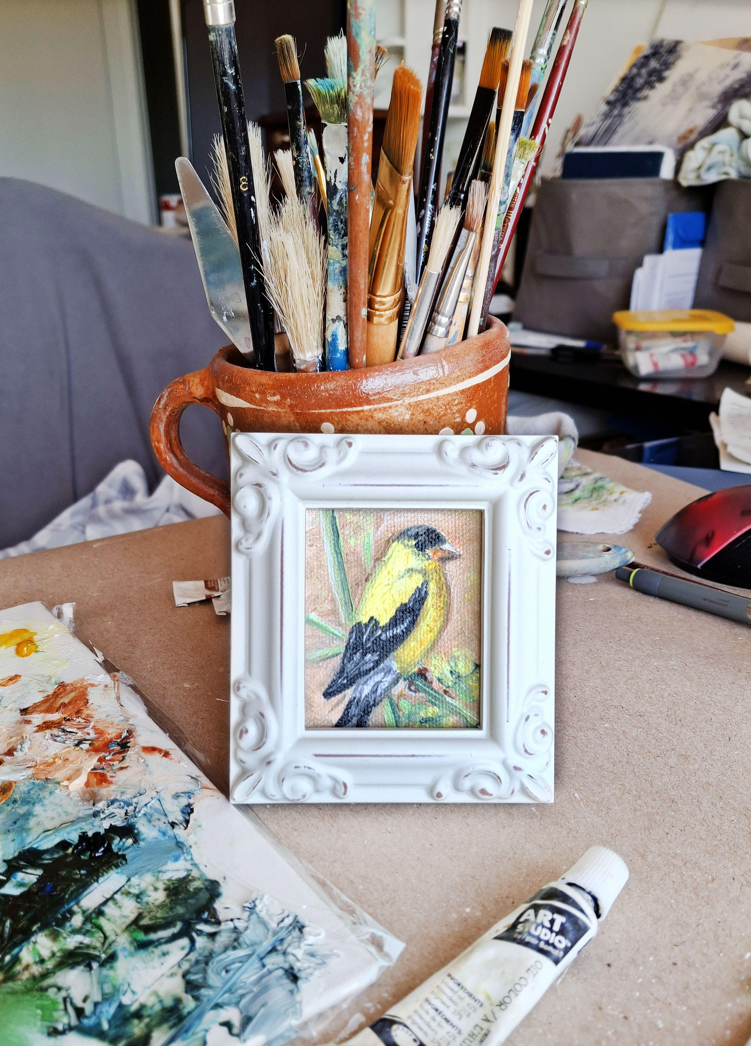 Yellow bird in vintage frame