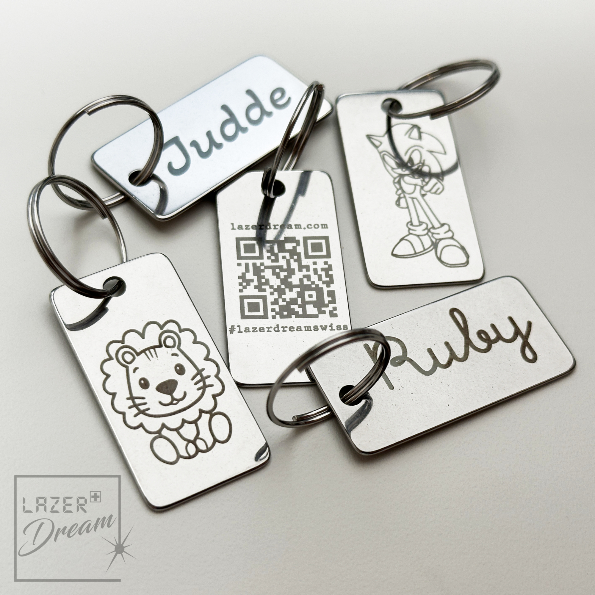 2x4cm Keychain/Bag charm in stainless steel with your logo or your own motif / Porte-clés/Charm en acier avec votre logo ou motif