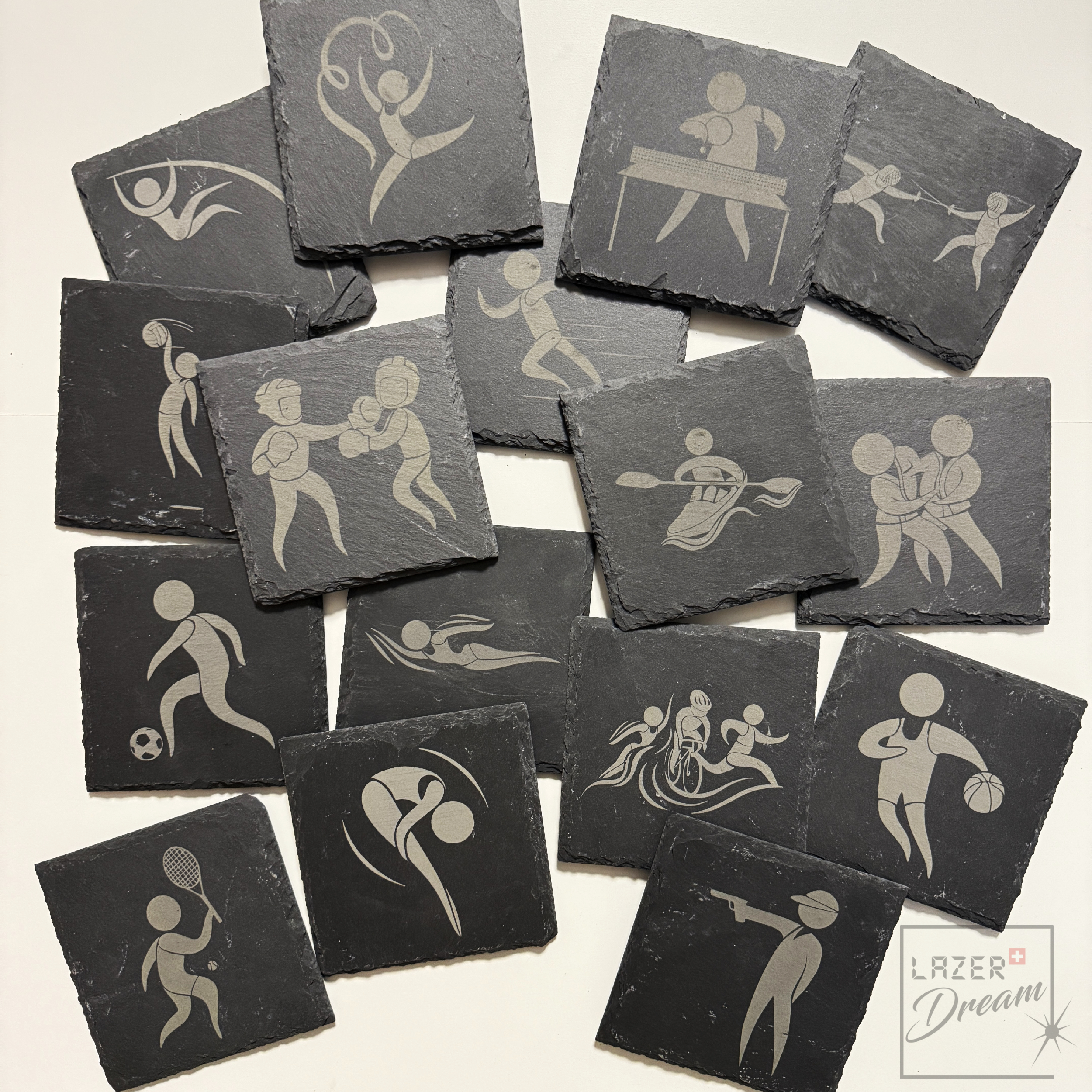 Slate coasters with Olympic sports motifs  / Dessous de verre en ardoise avec motifs sports olympiques