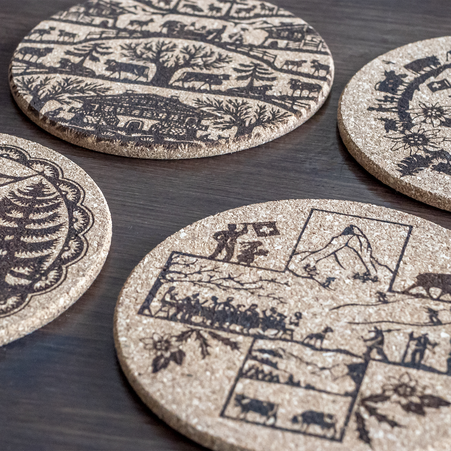 Cork coasters with Swiss cut out inspired motifs / Dessous de verre en liège avec motifs inspirés par les découpages Suisse