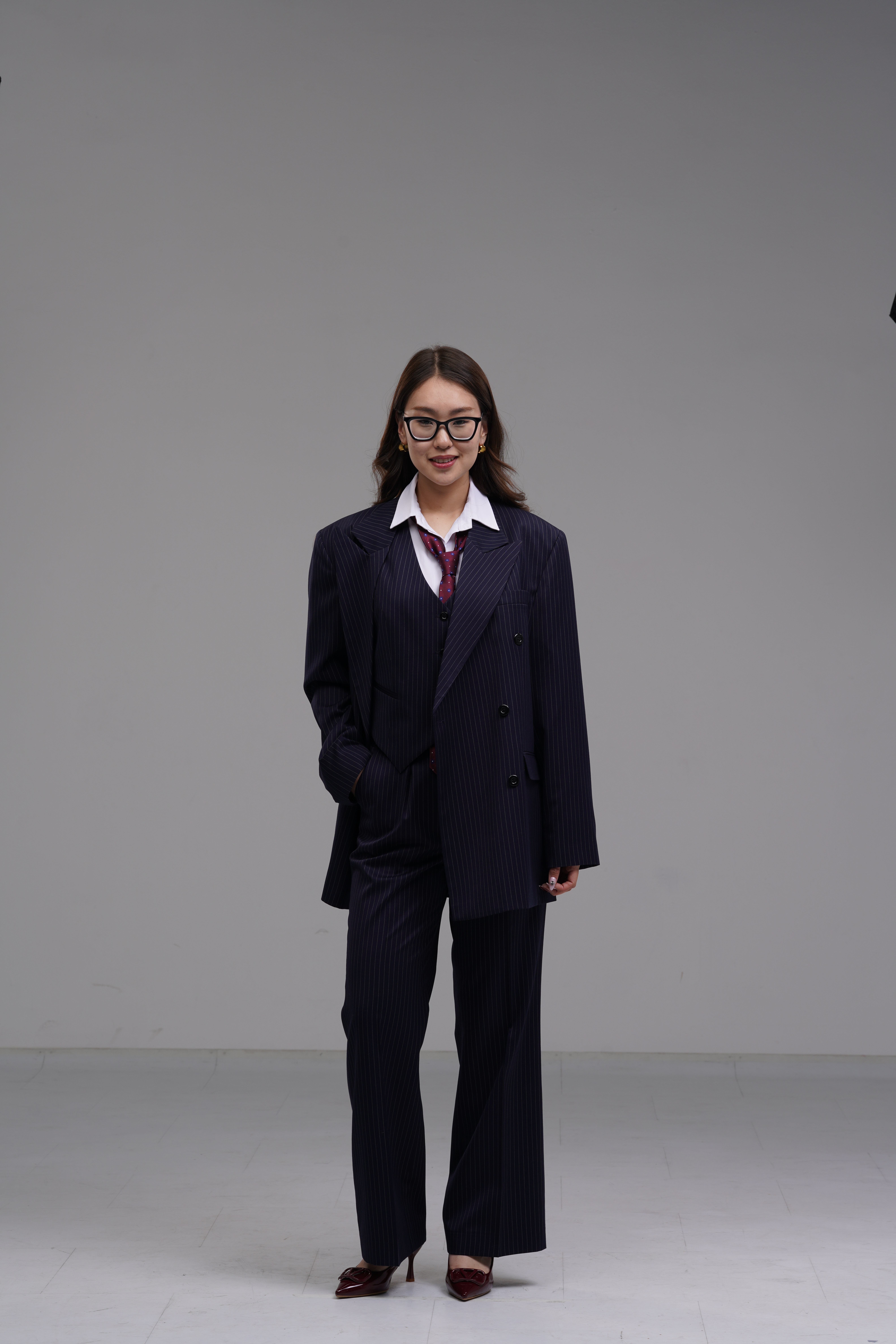 Dark blue pinstripe double-breasted blazer