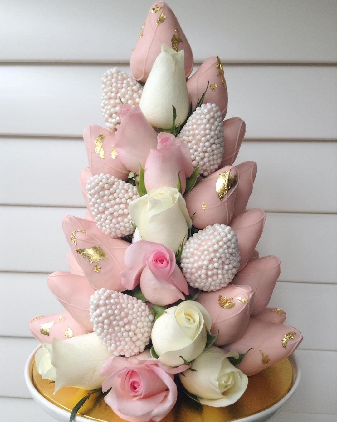 Elegant floral arrangement with 30 covered Strawberries & 12 fresh roses