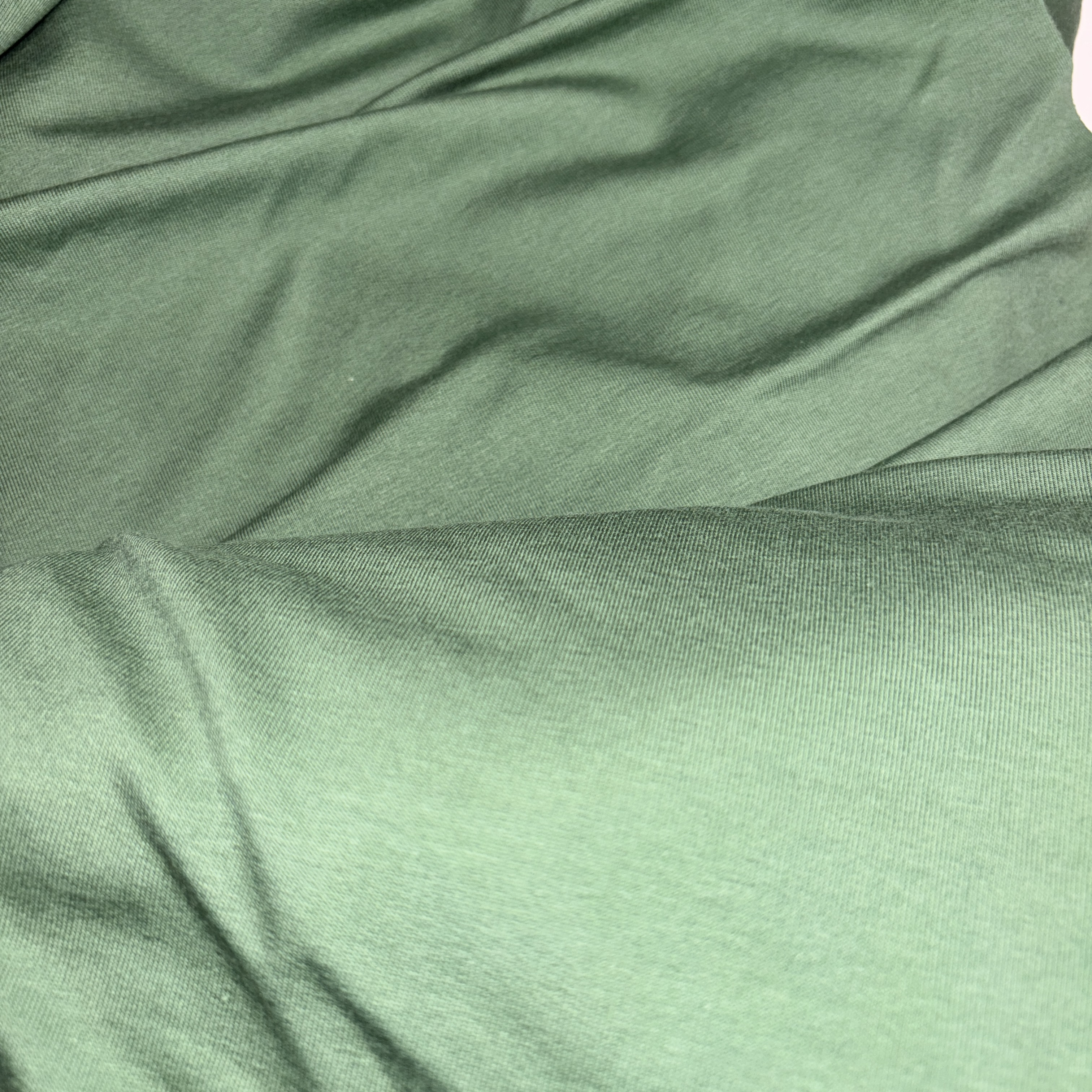 Sūnu zaļa cilpiņtrikotāža