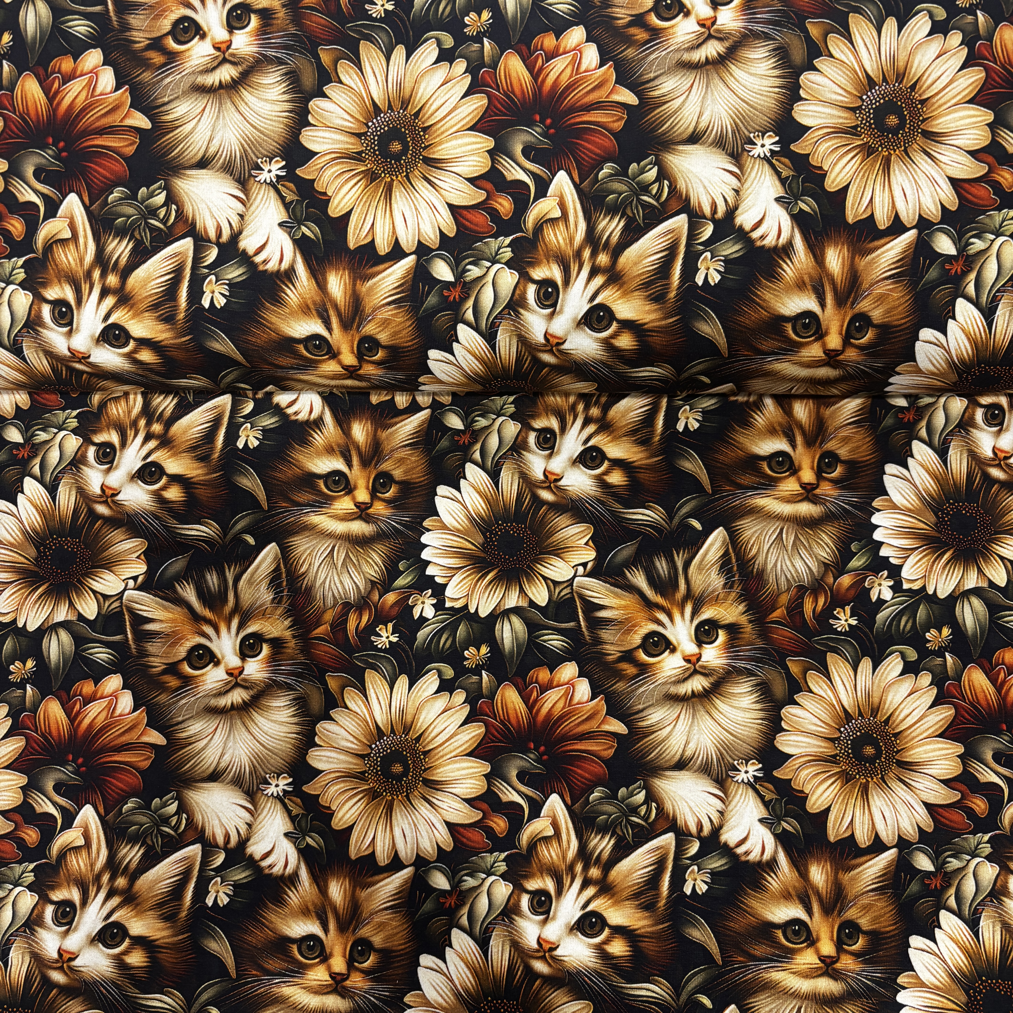 Kaķi un ziedi trikotāža