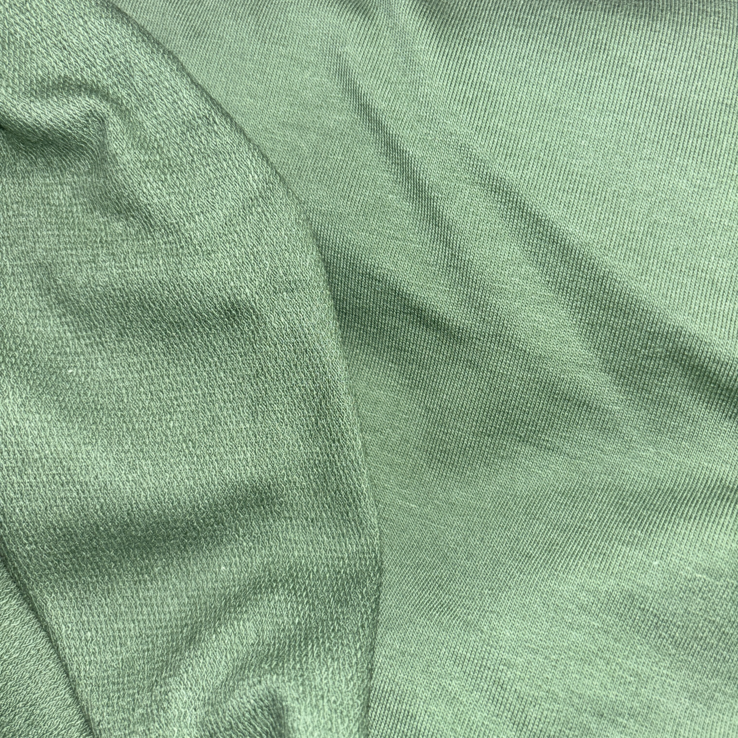 Sūnu zaļa cilpiņtrikotāža