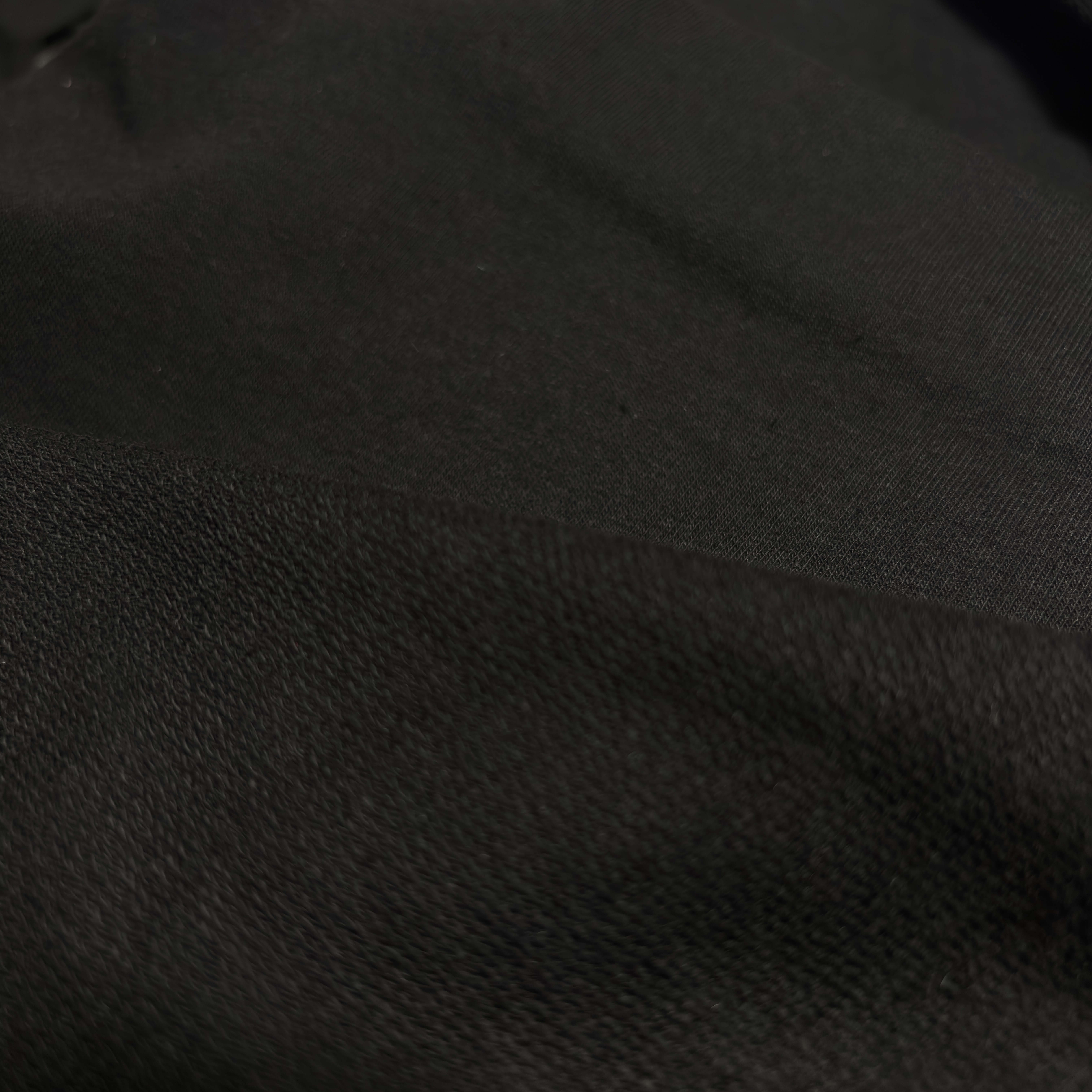 Melnā cilpiņtrikotāža