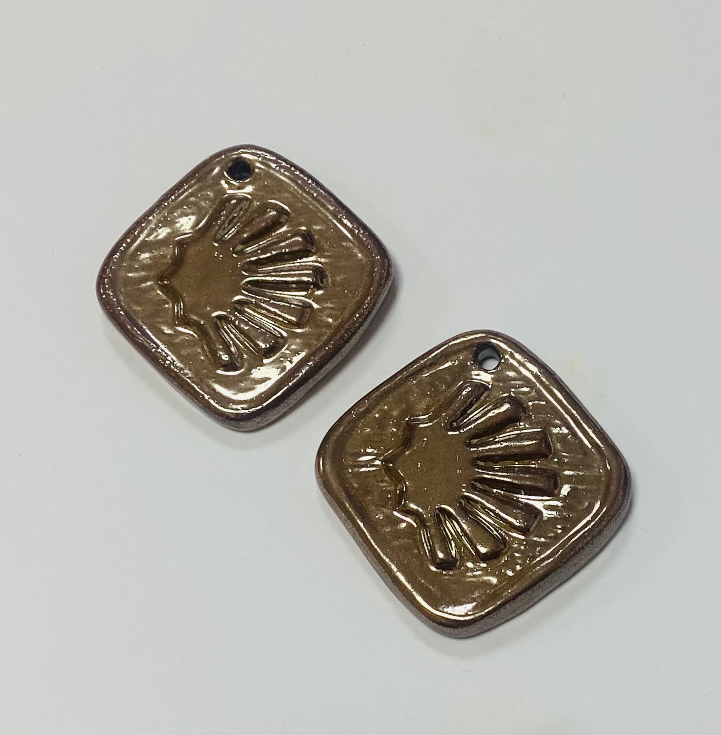 Keraminiai pakabukai su kriaukle