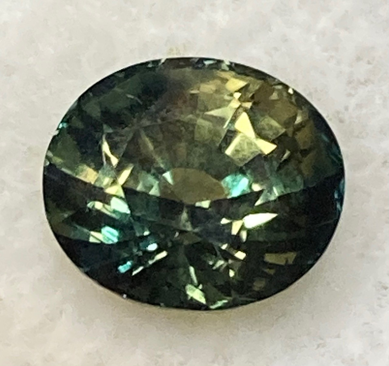 Sapphire -Natural Green with teal and yellow flash