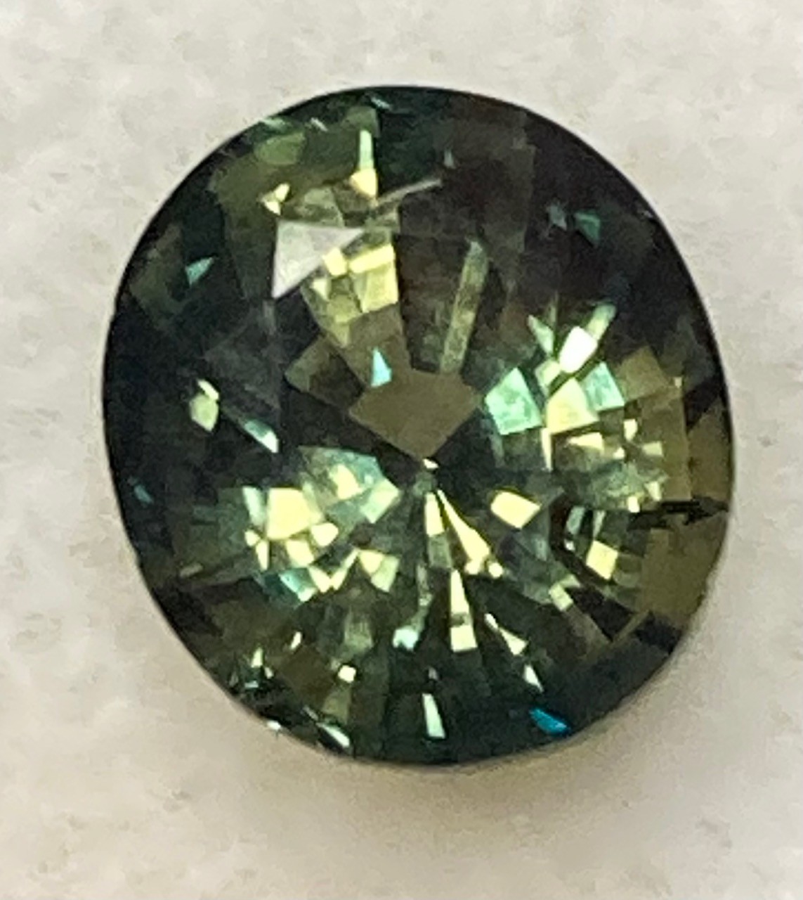Sapphire -Natural Green with teal and yellow flash