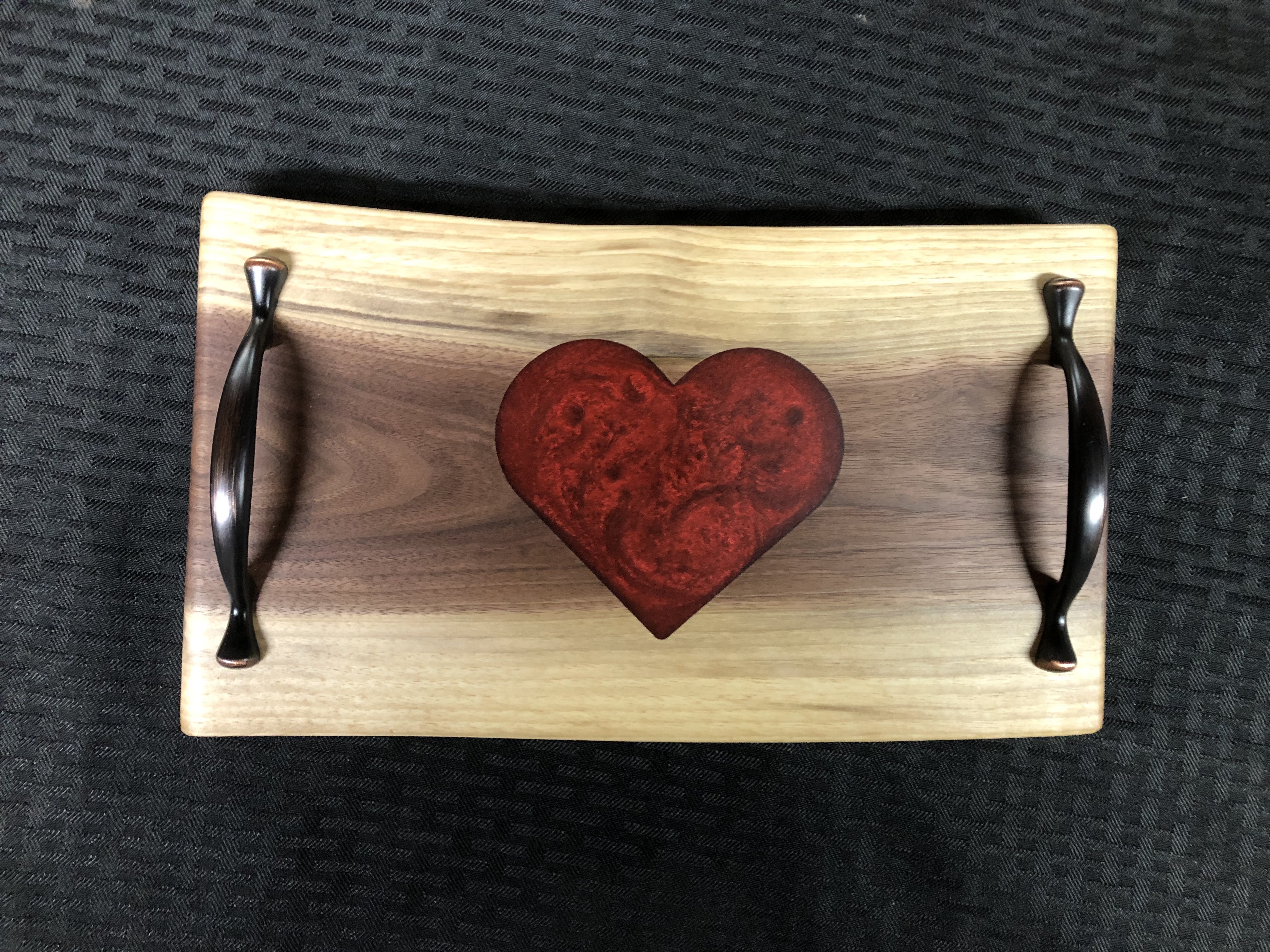 Charcuterie board with resin heart inlay