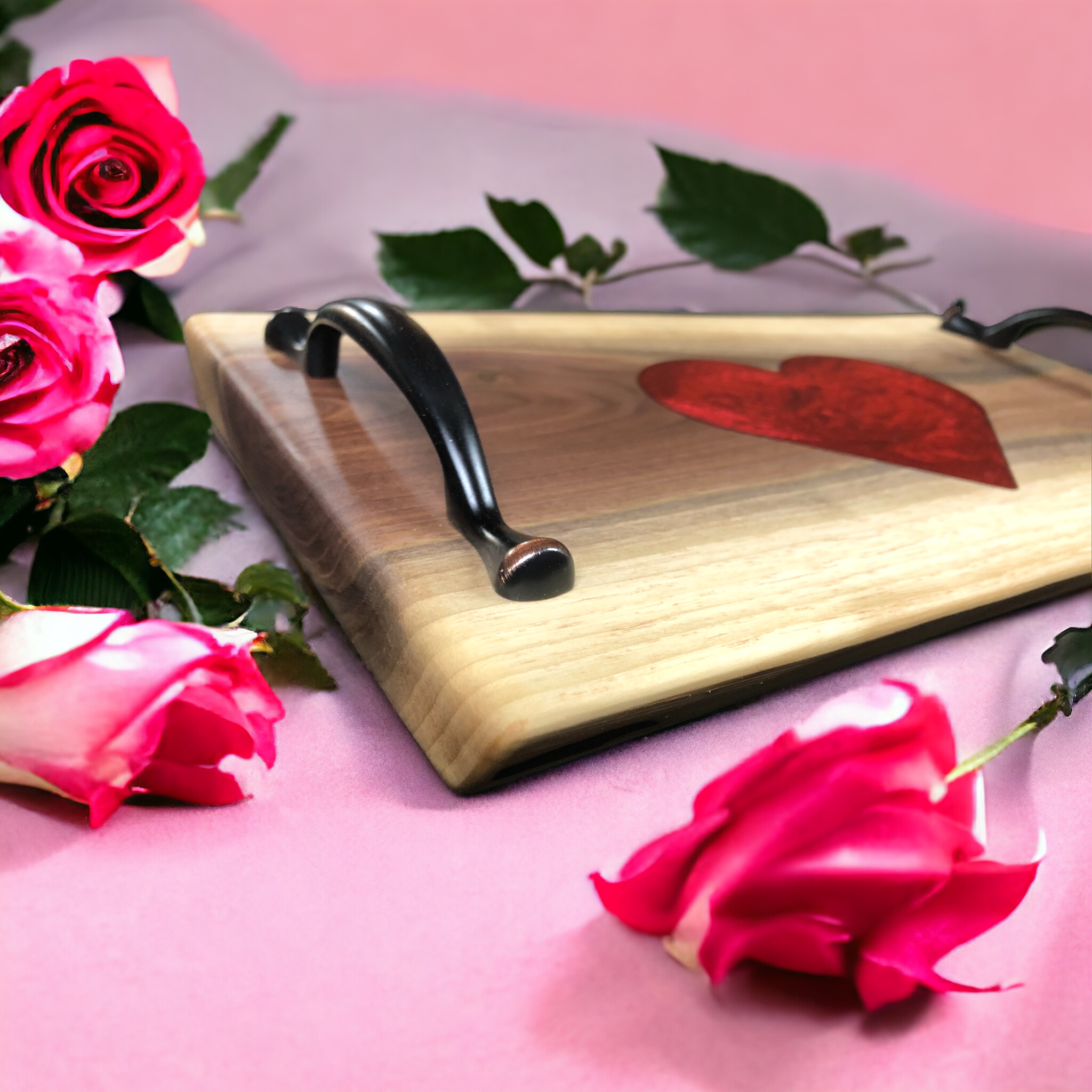 Charcuterie board with resin heart inlay