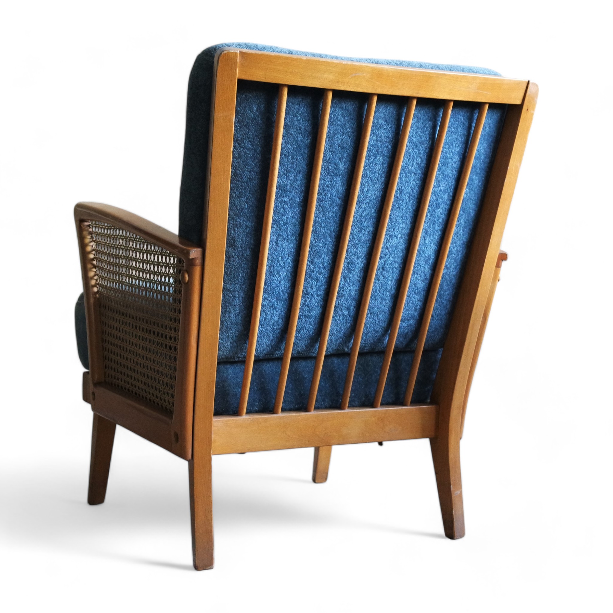 Vintage lounge chair with rattan armrests