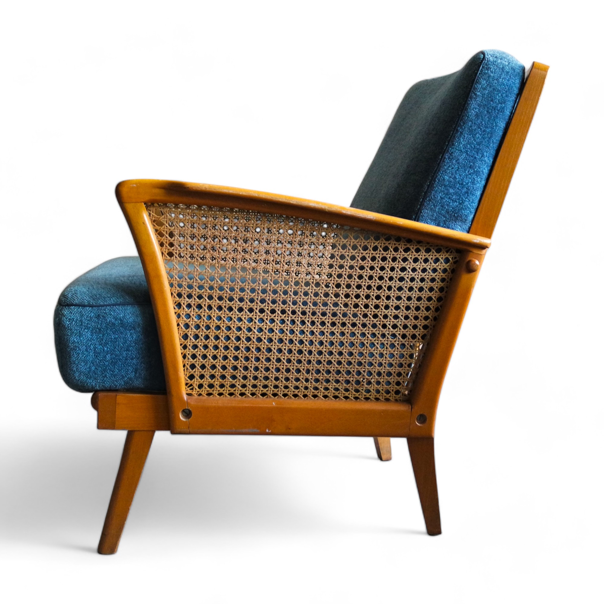 Vintage lounge chair with rattan armrests