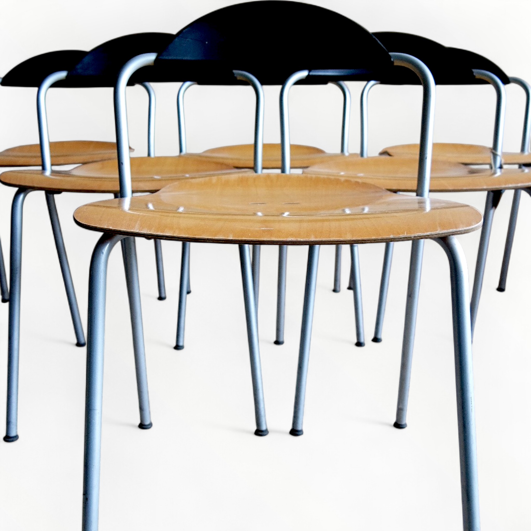 Stackable chairs by Vico Magistretti 