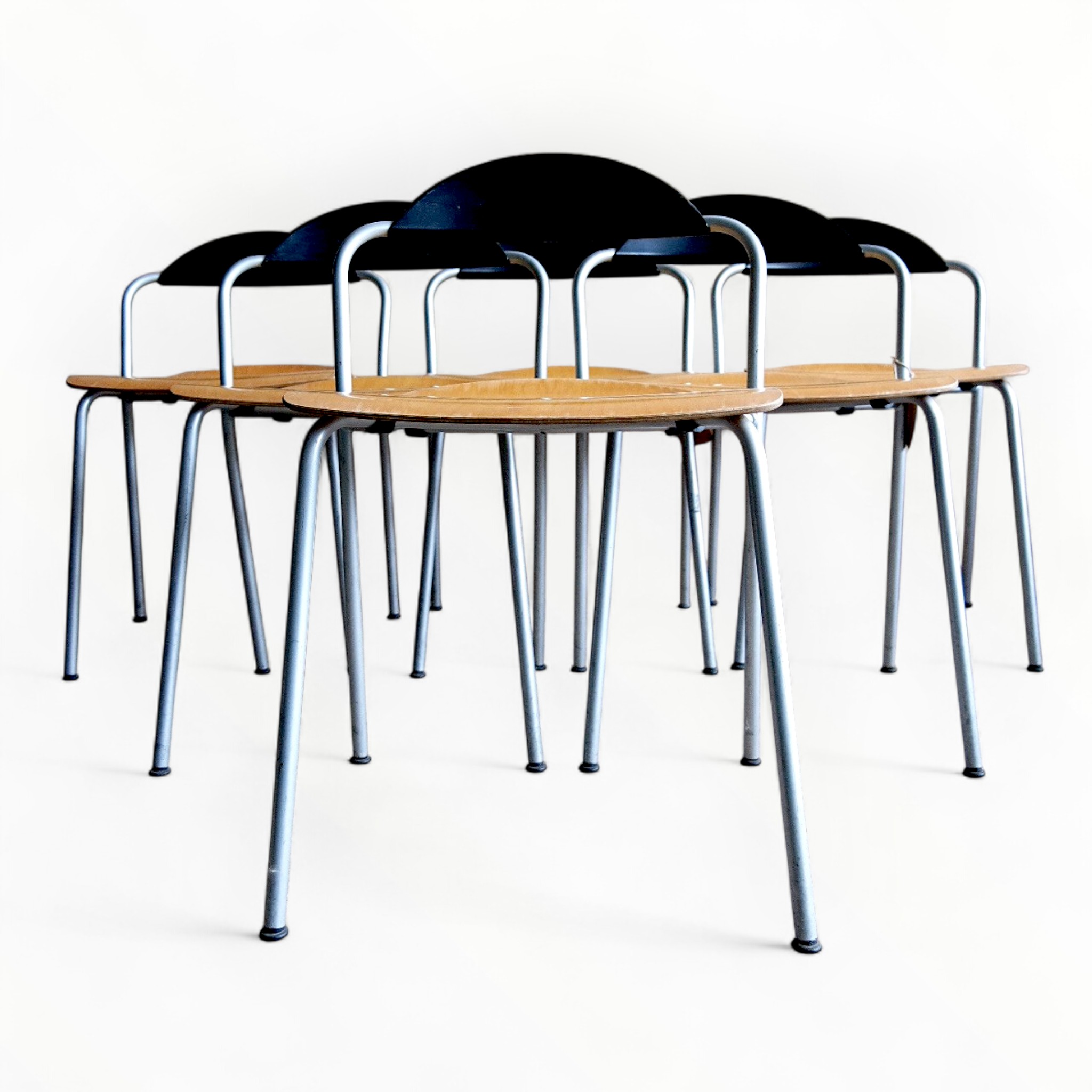 Stackable chairs by Vico Magistretti 