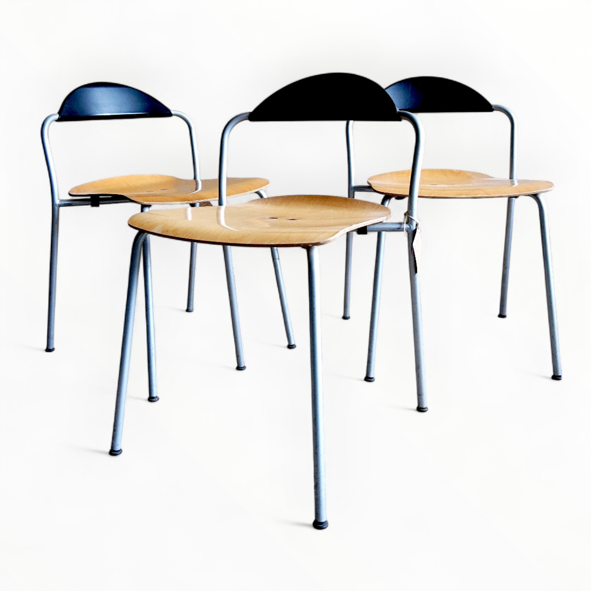 Stackable chairs by Vico Magistretti 