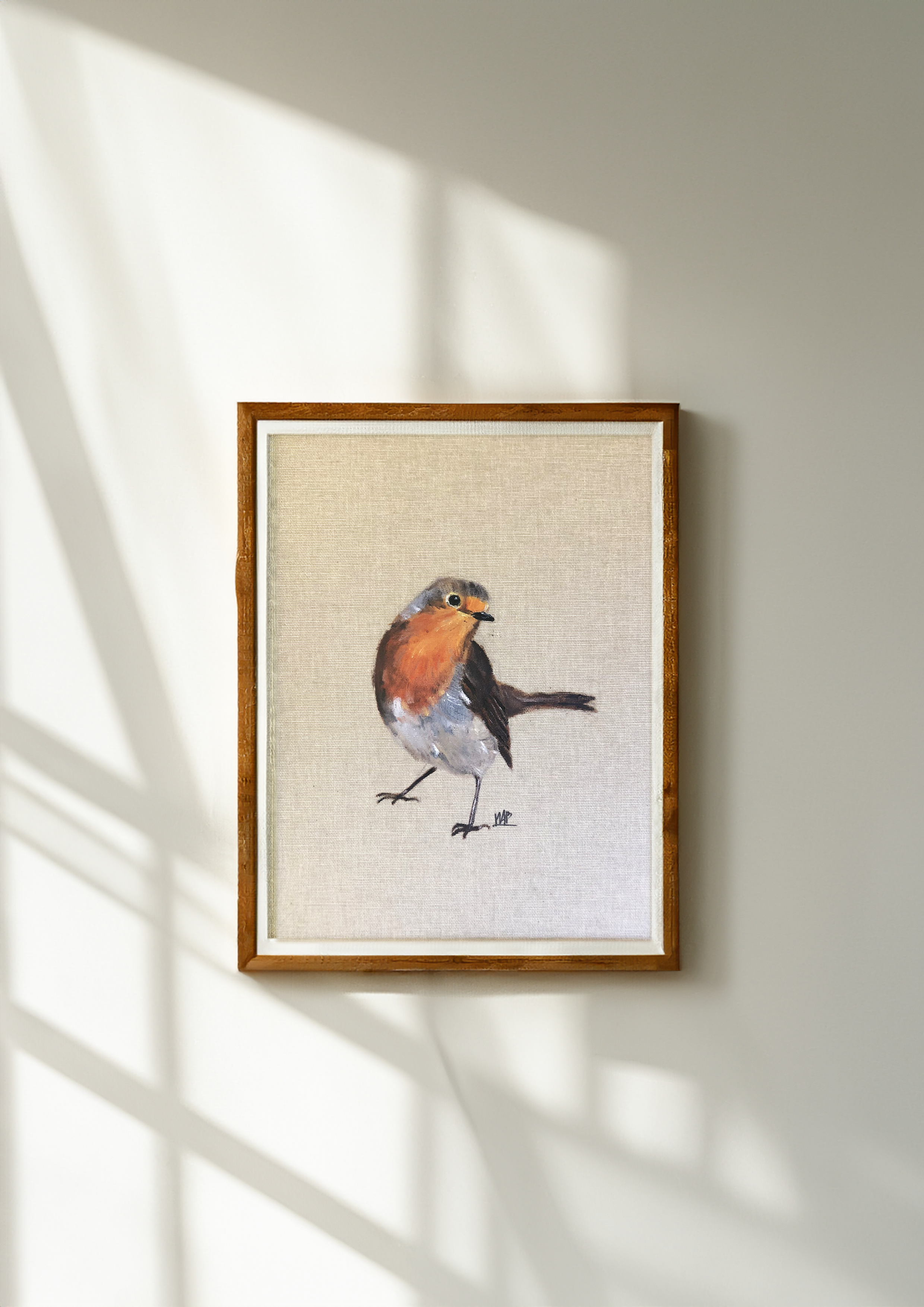 Rouge-gorge sur sa branche