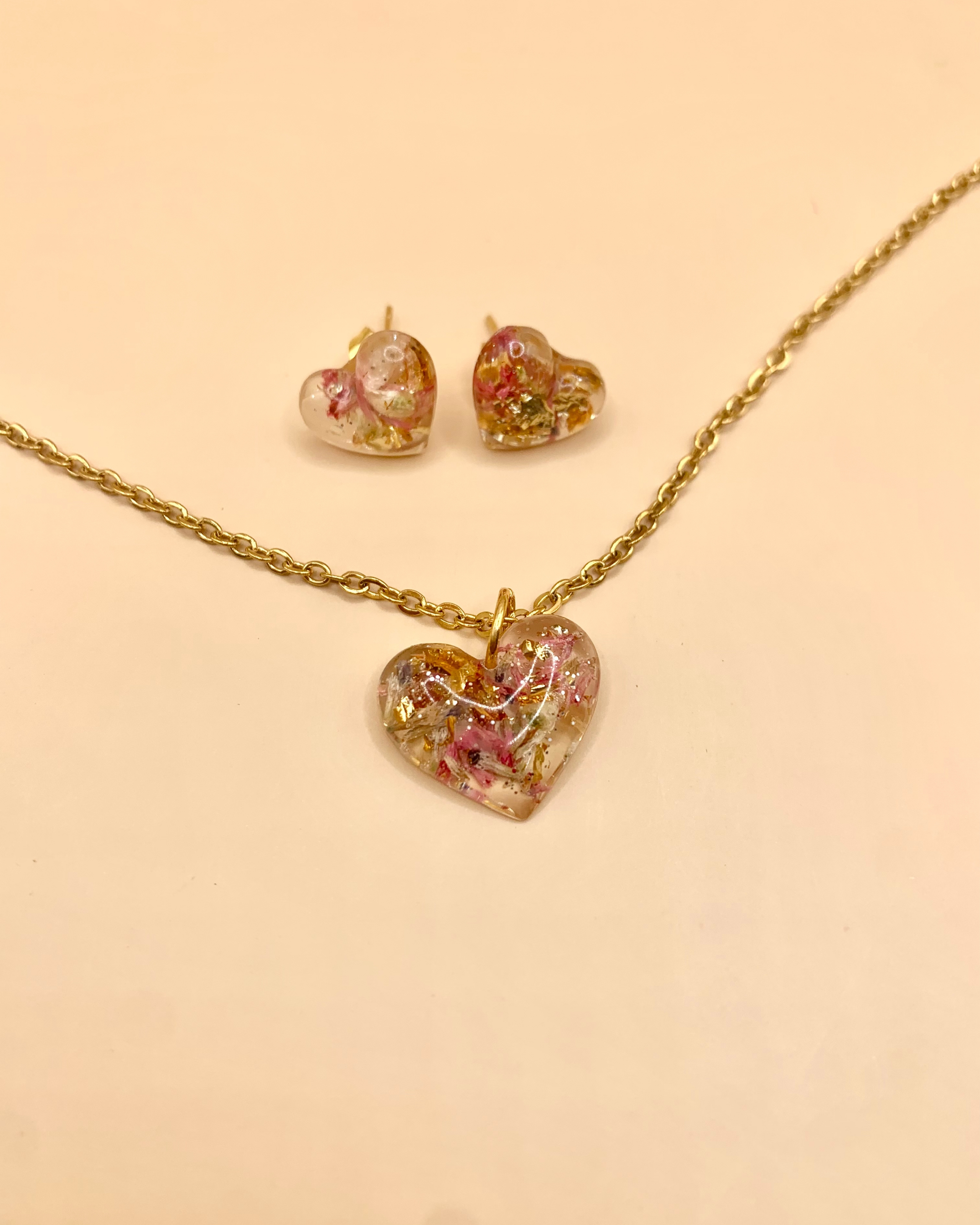 Juego de joyería de resina con flor