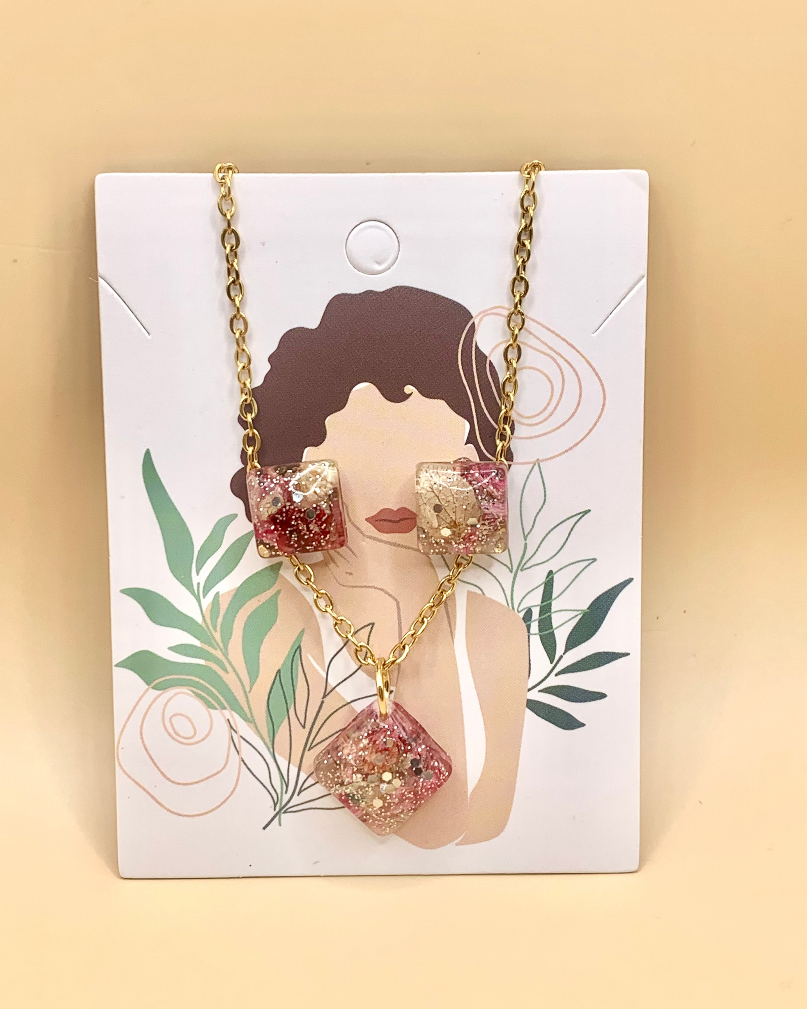 Conjunto de joyería con flor