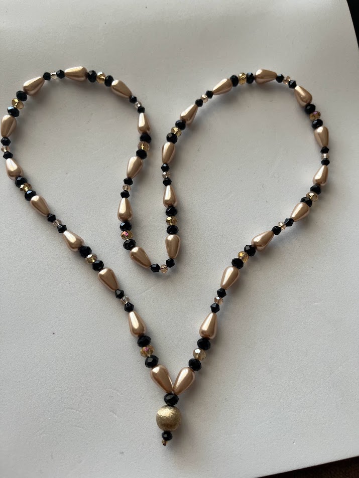 COLLIER FEMME TONS DORÉ ET NOIR