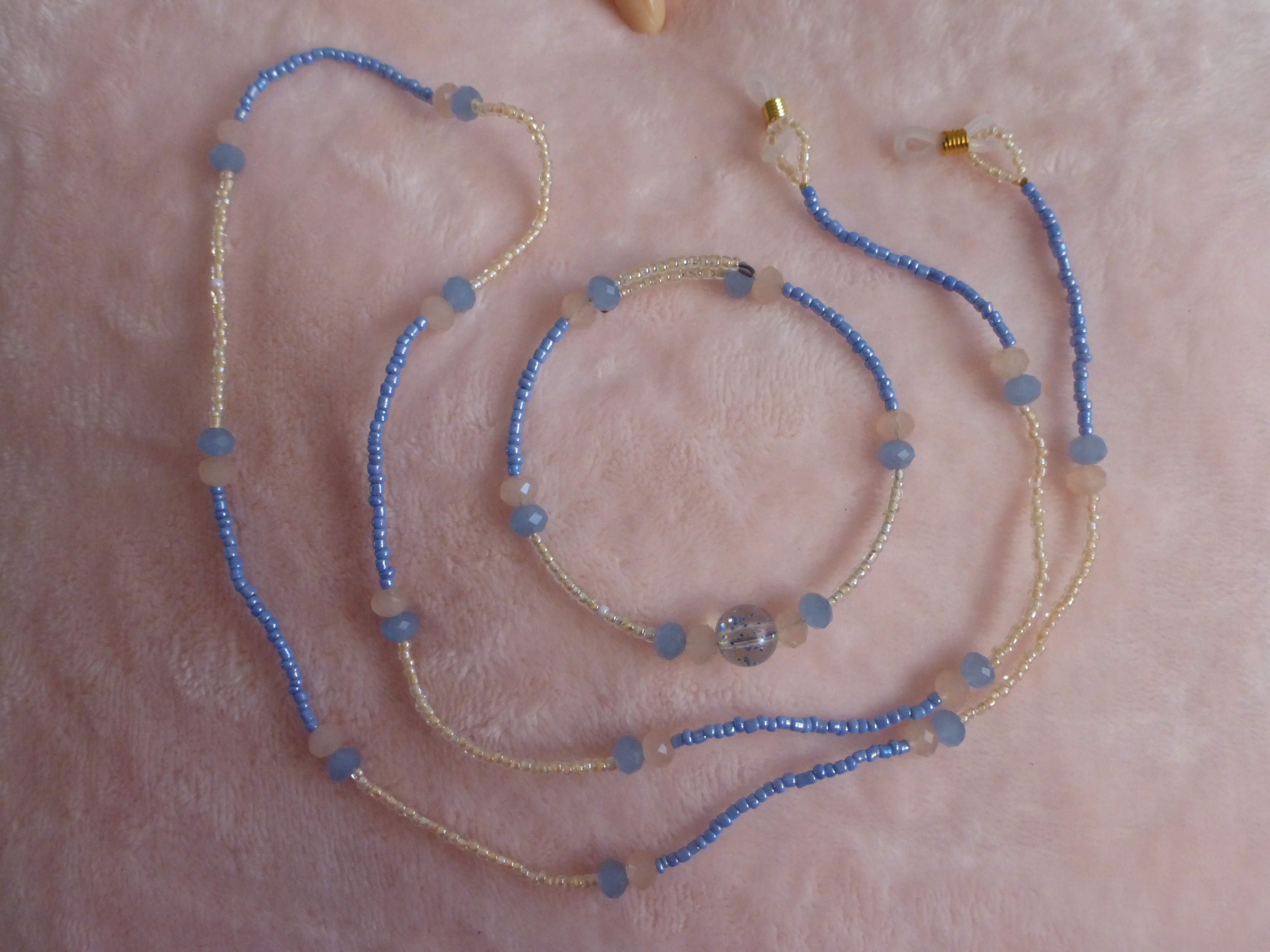 CORDON A LUNETTES ET BRACELET BLEU ET ORANGE PALE