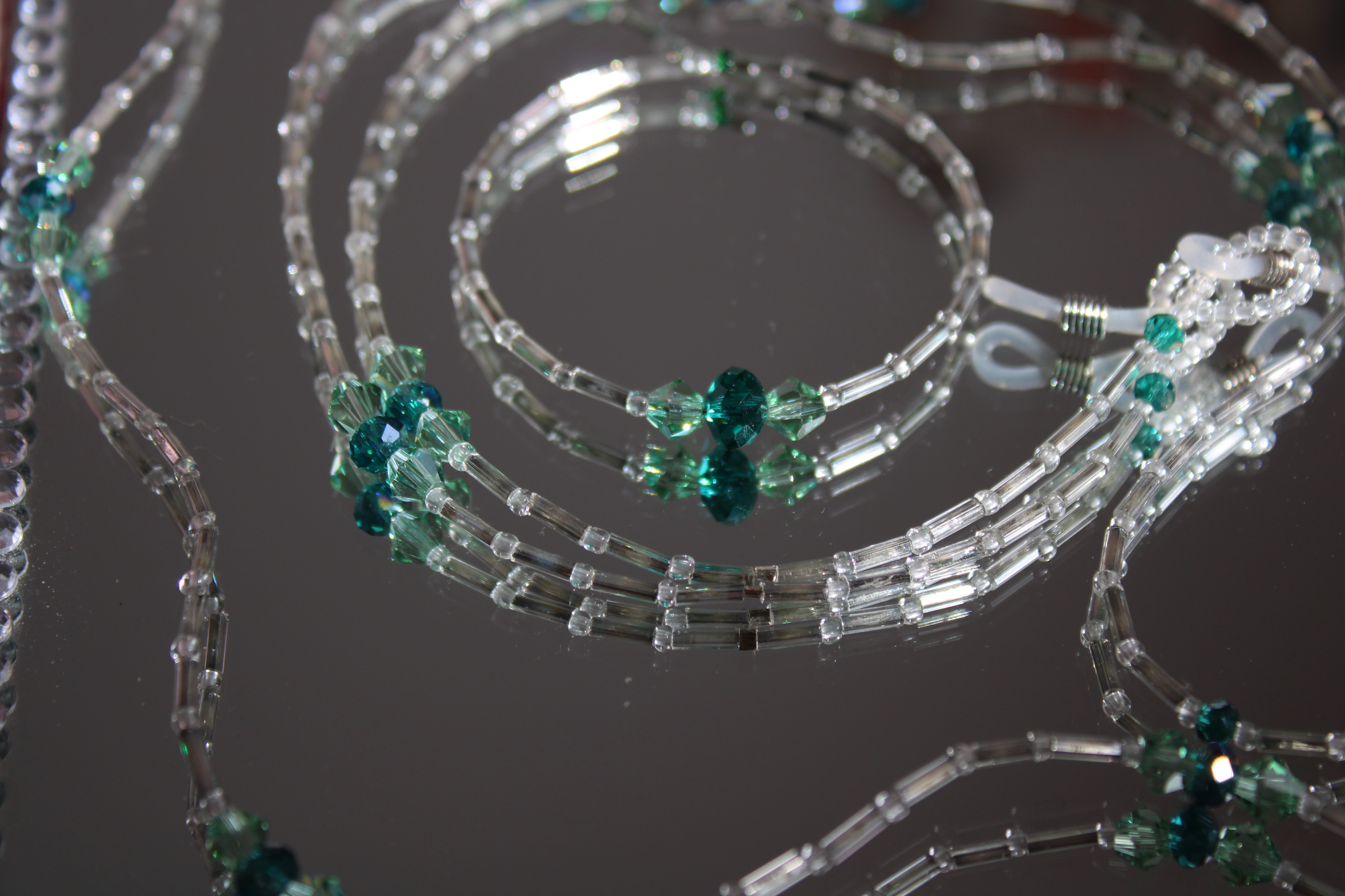 CORDON A LUNETTES COLLIER BRACELET TRANSPARENT ET VERT