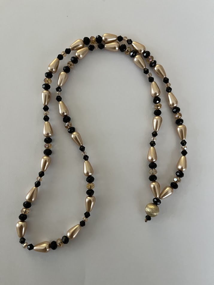 COLLIER FEMME TONS DORÉ ET NOIR