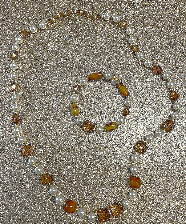 COLLIER FEMME MARRON ET BLANC