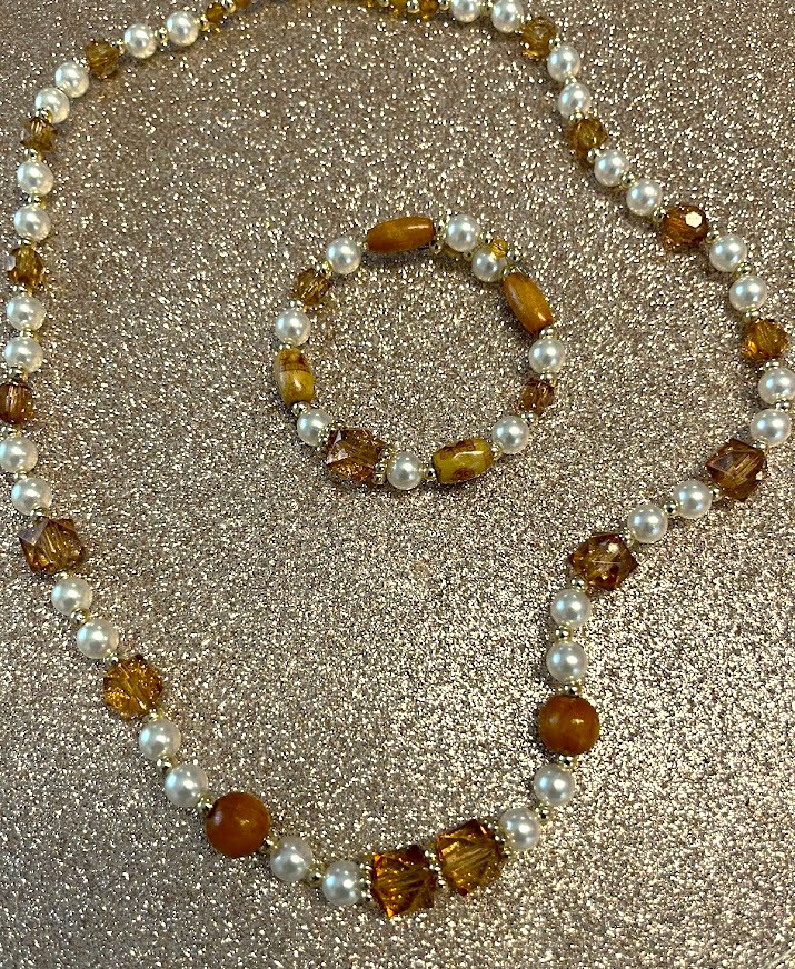 COLLIER FEMME MARRON ET BLANC