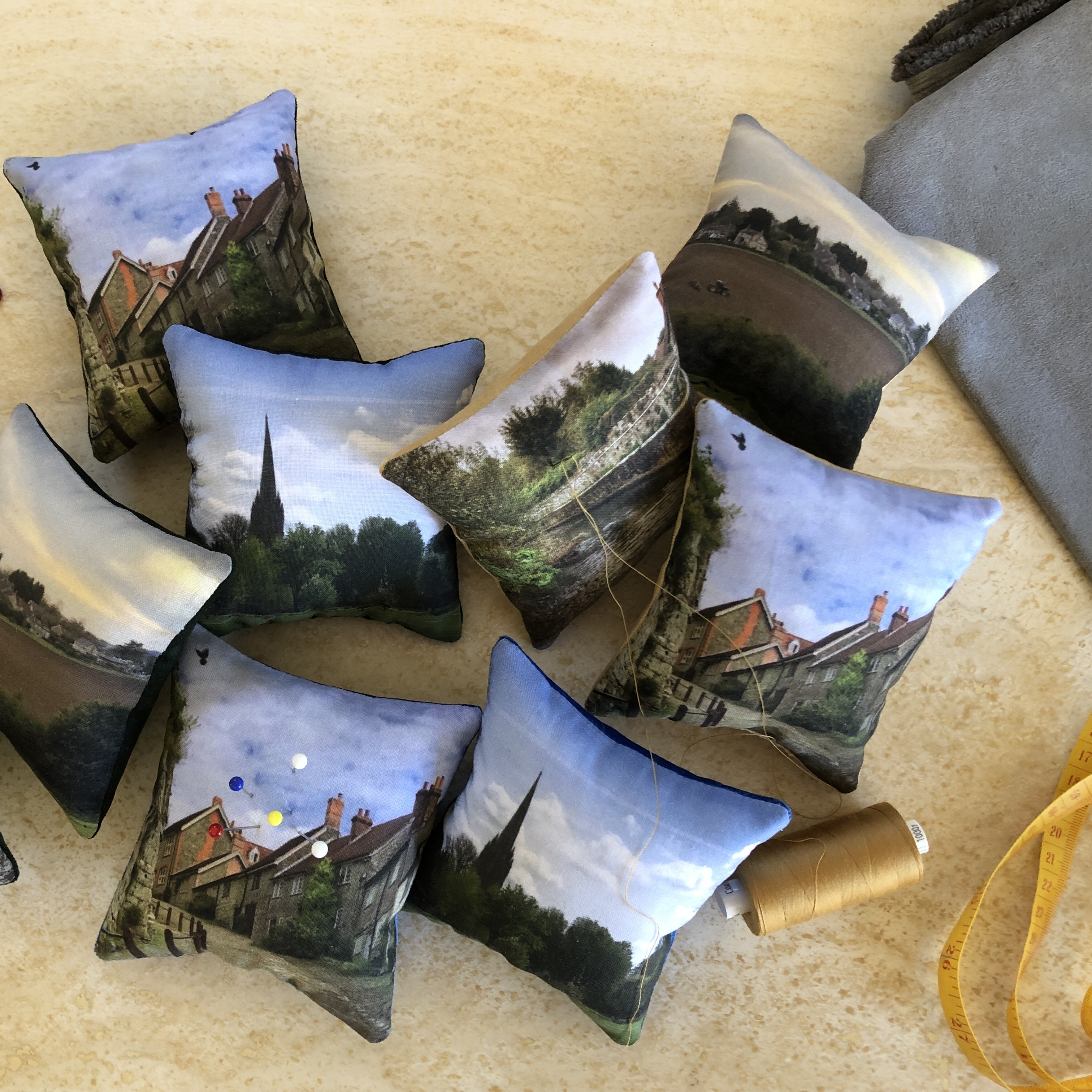 Velvet backed cotton pincushions printed with photos of Dorset/ Wiltshire landmarks