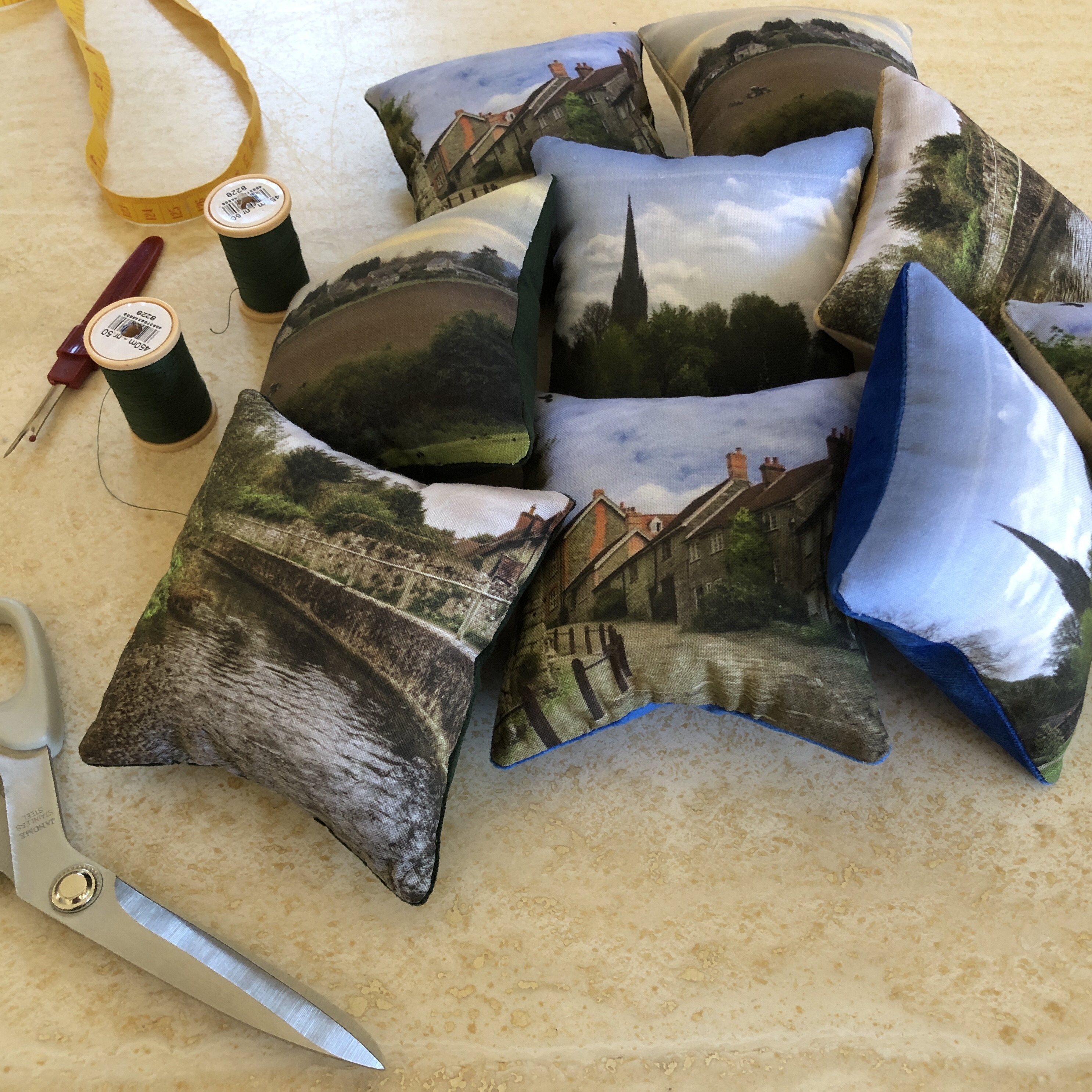 Velvet backed cotton pincushions printed with photos of Dorset/ Wiltshire landmarks