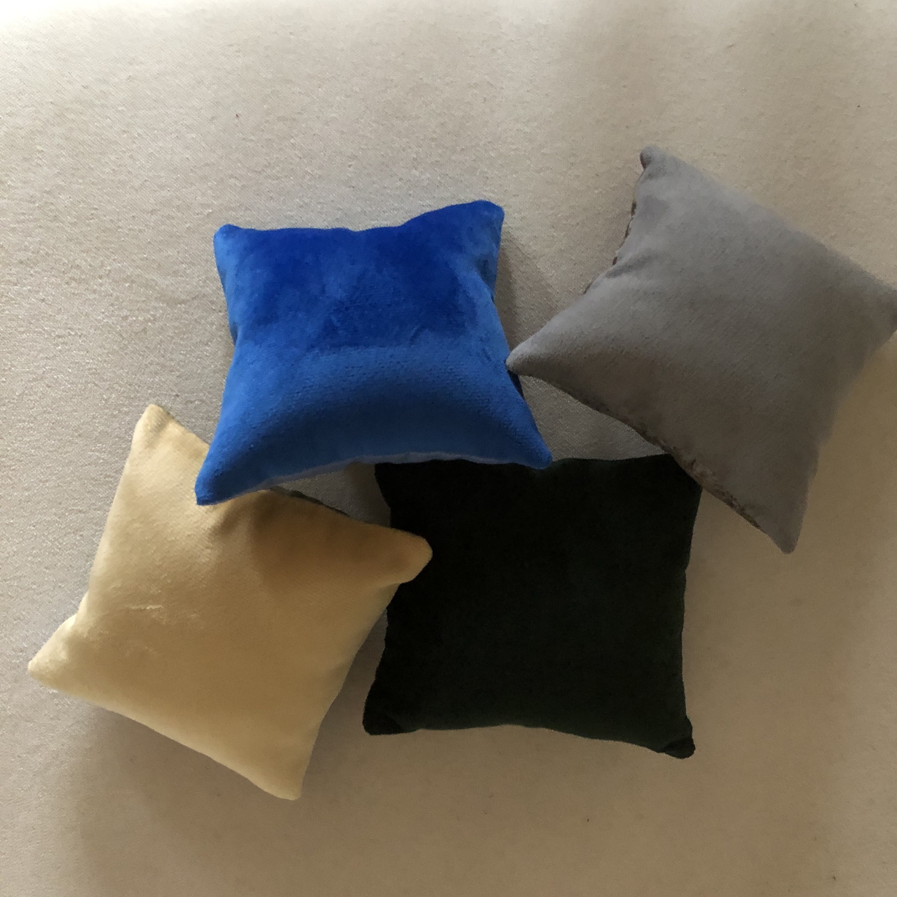 Velvet backed cotton pincushions printed with photos of Dorset/ Wiltshire landmarks