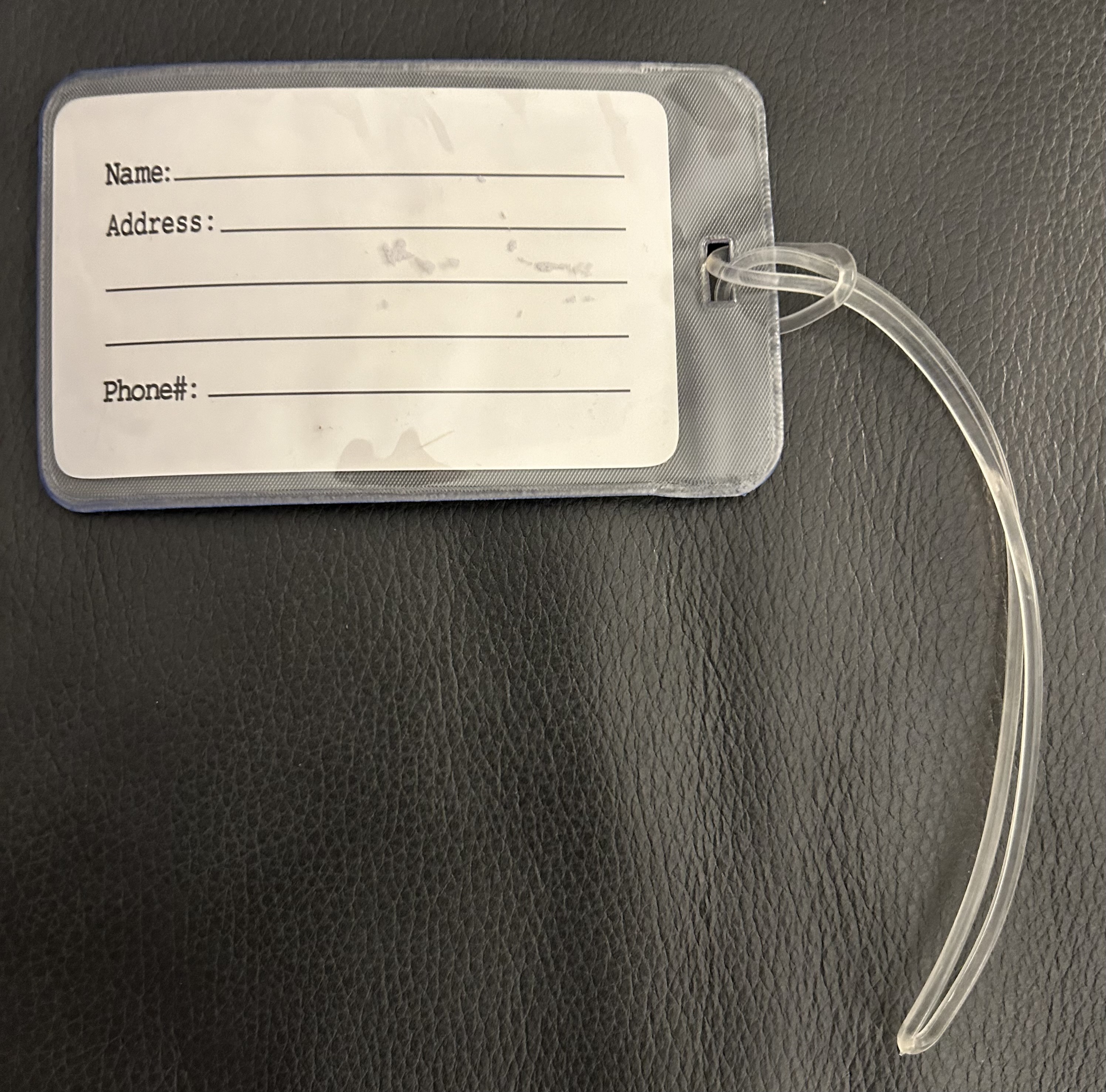 Merch: Luggage tag