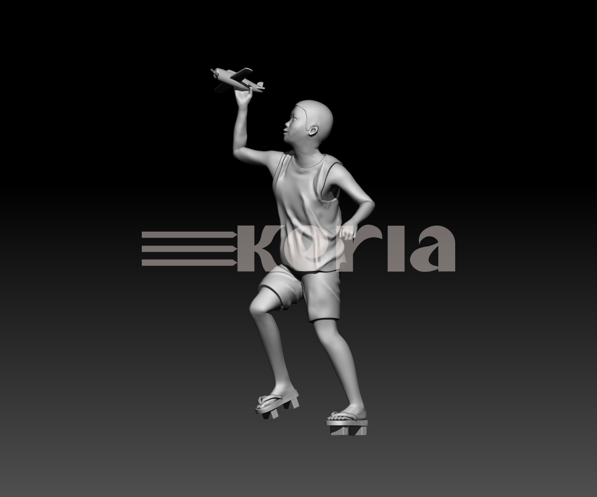 Enfant asiatique jouant avec un avion - Shinji