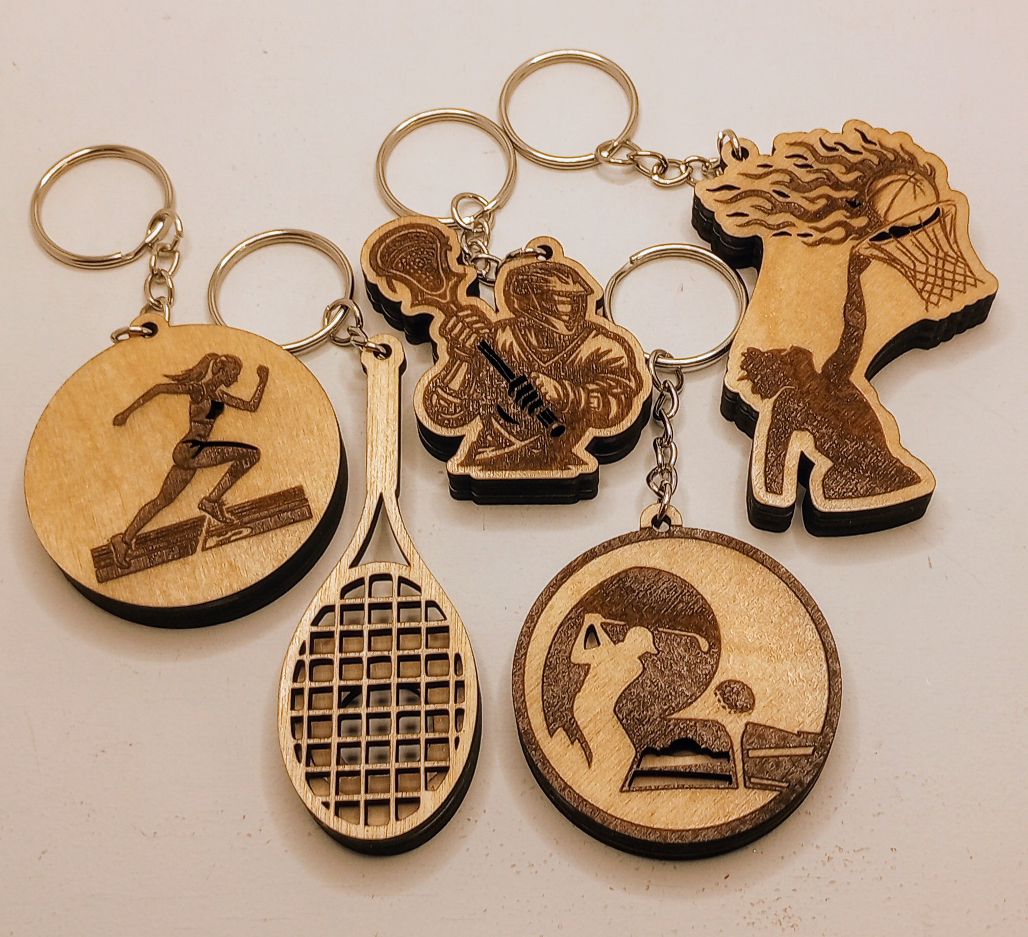 Sports themed wooden keychains, ready for essential oils....SVG ONLY