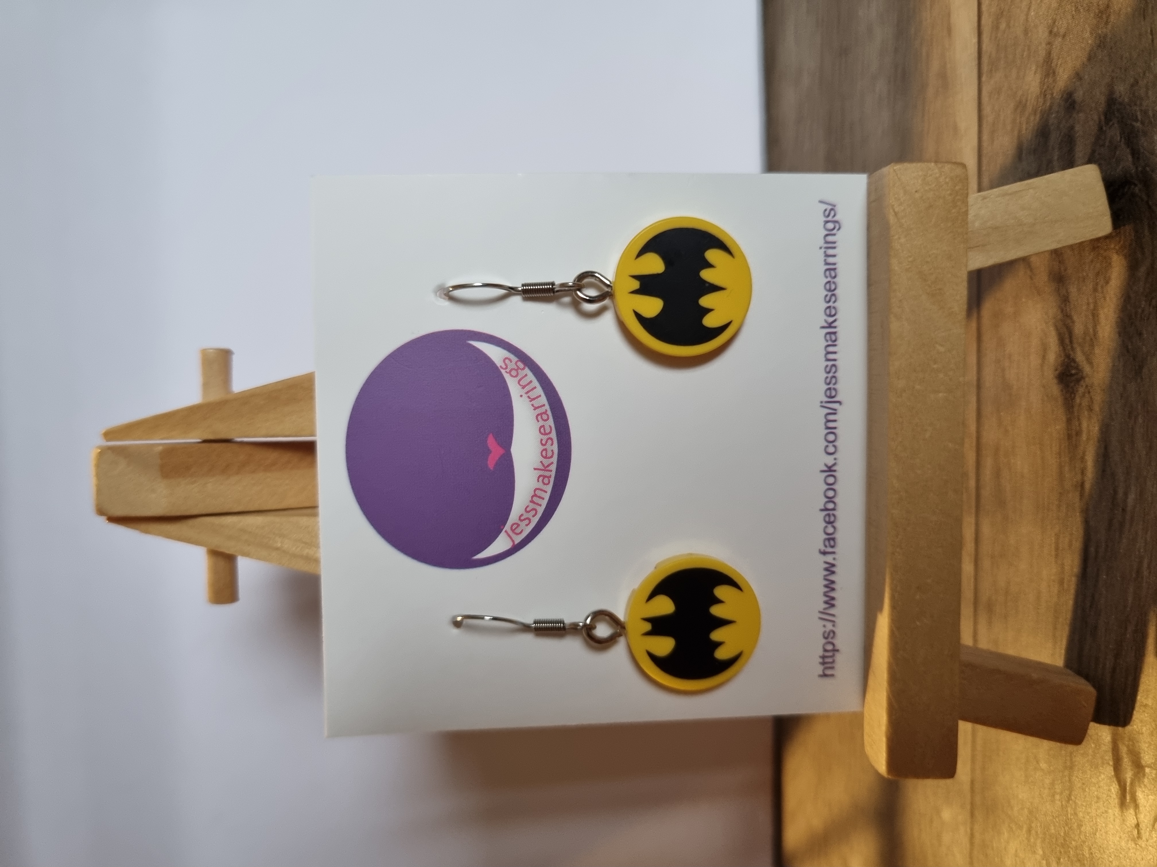Super hero earrings