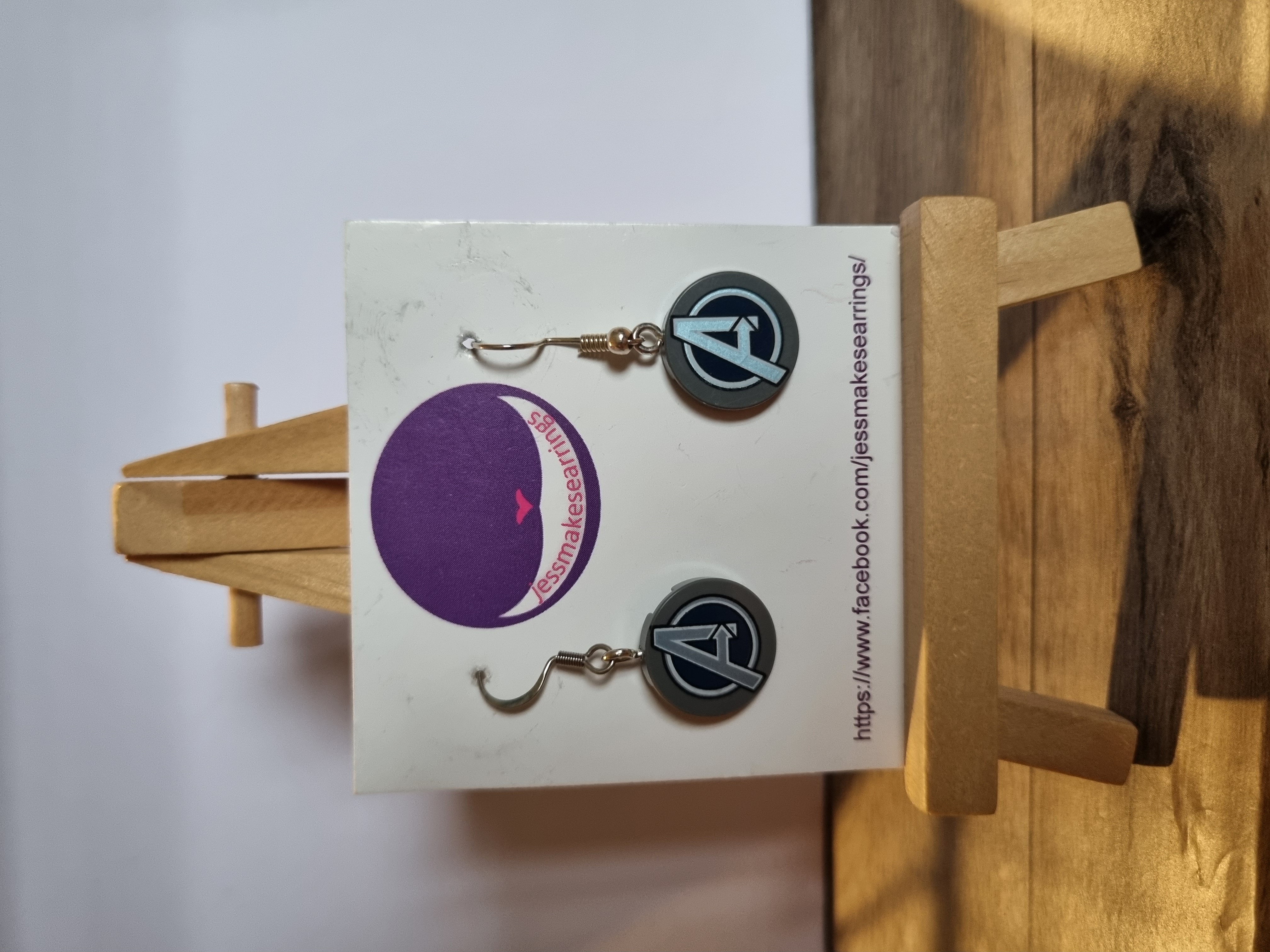 Super hero earrings