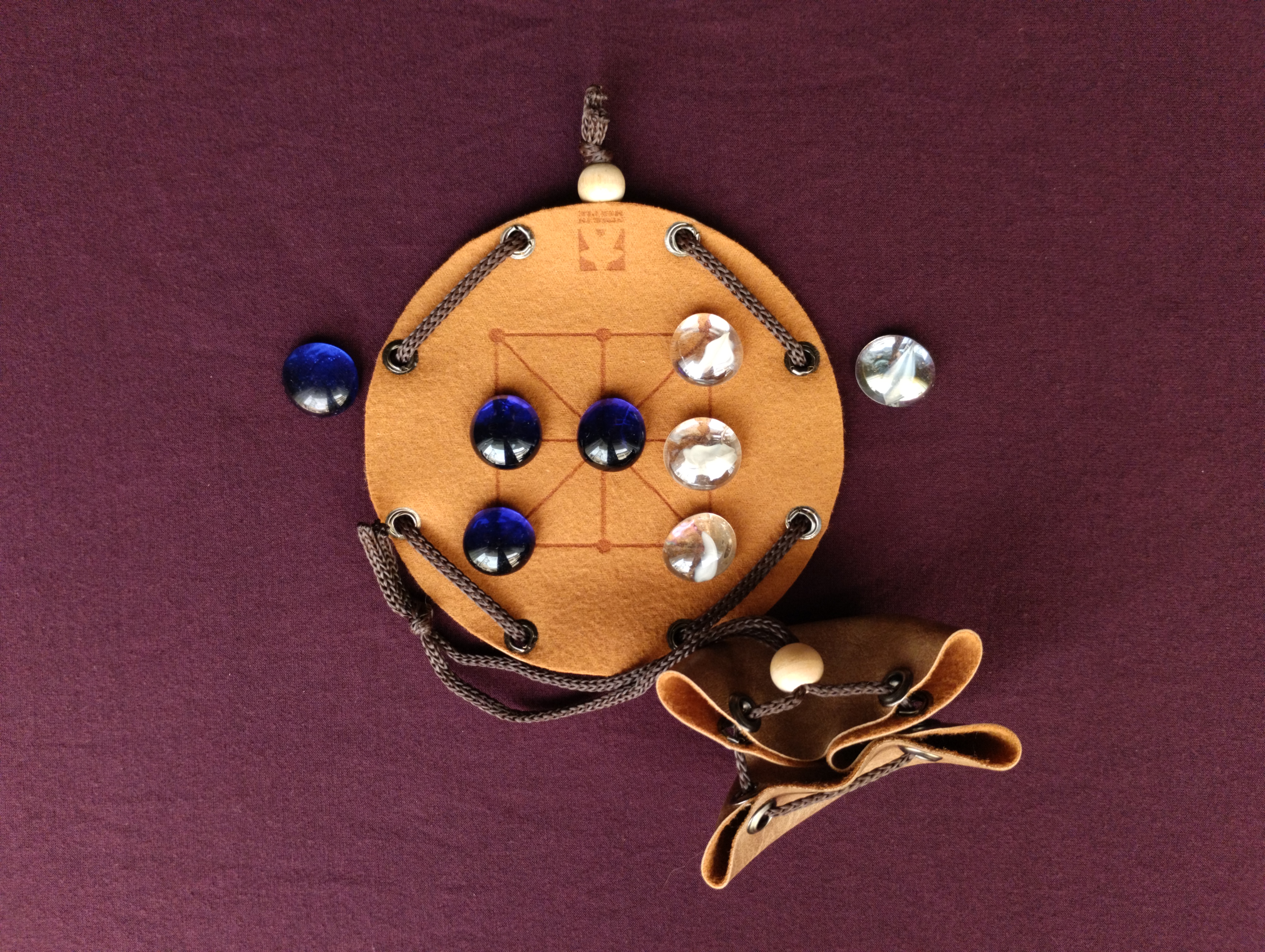 Achi Tapatan Ghana board game in faux leather pouch, 12cm, 4.72inch diameter