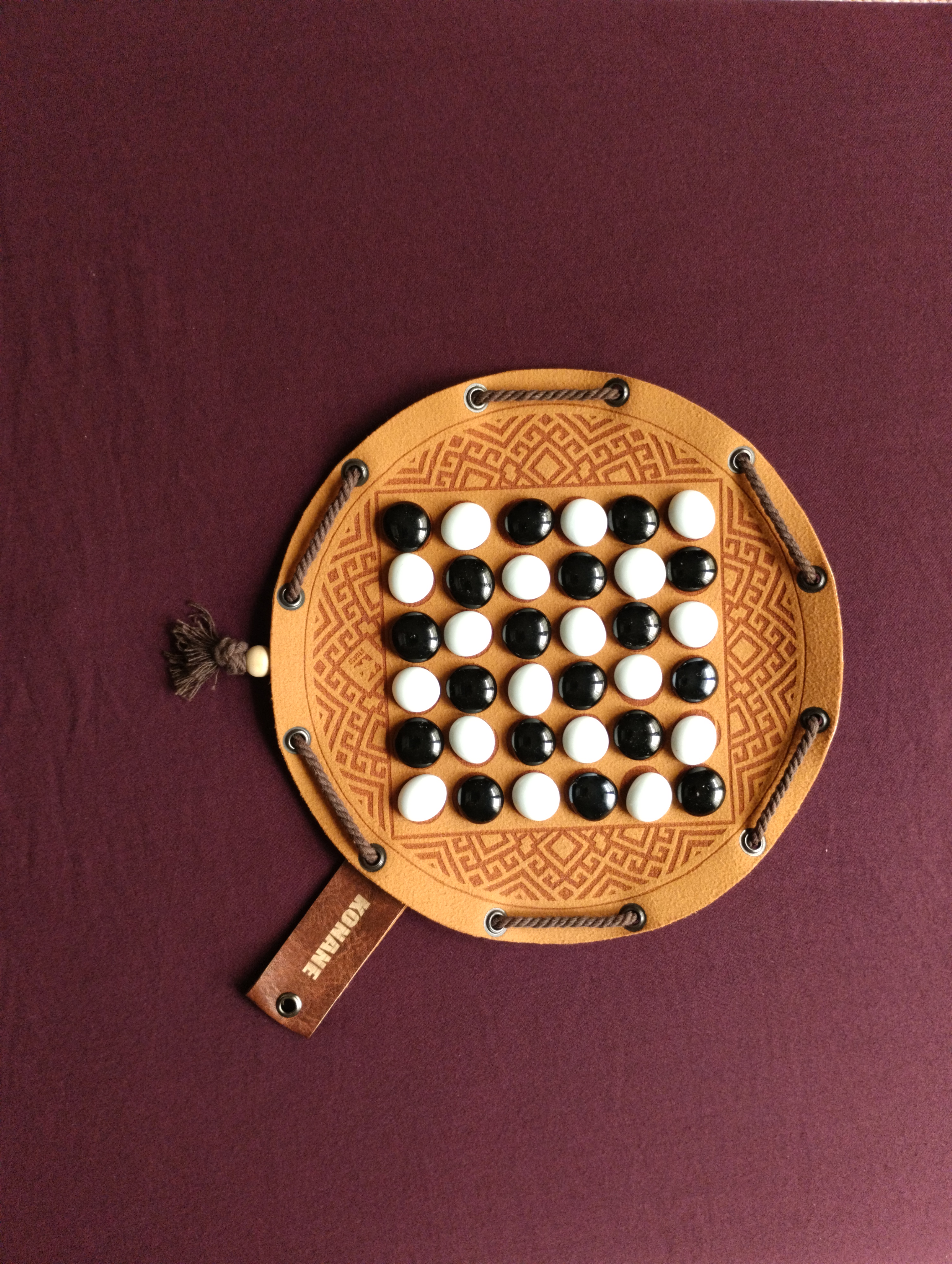 Konane hawaiian ancient historic board game in faux leather pouch, 22.5cm, 8.85inch diameter