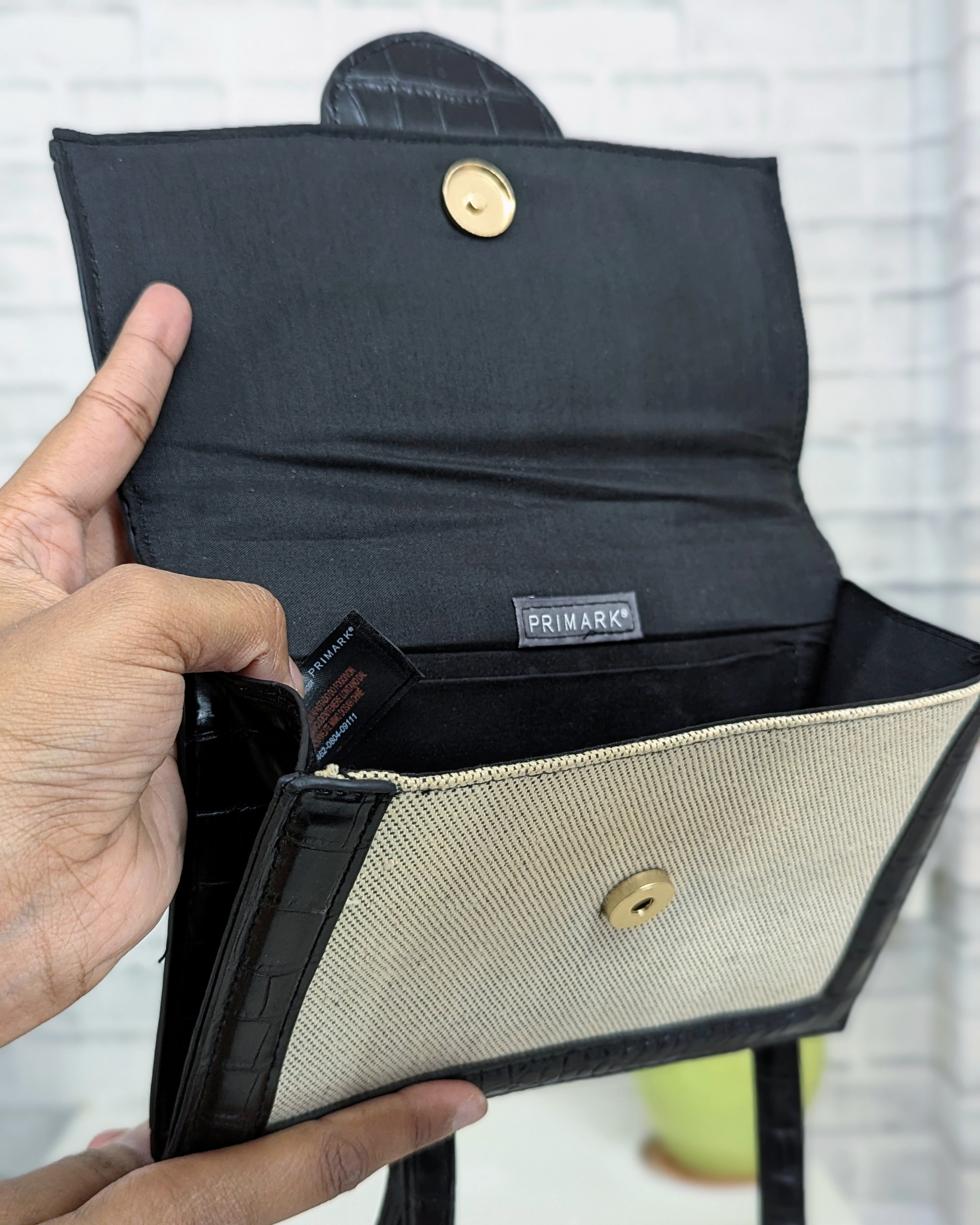 Black and white sling bag